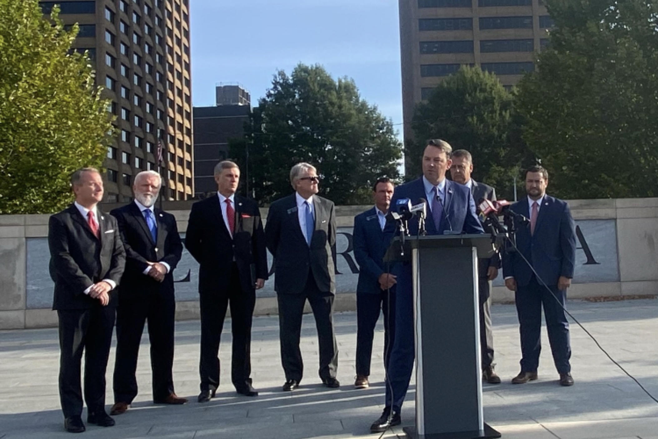 Georgia Lt. Gov. Burt Jones (center) and state senators announce a special subcomittee to investigate overcrowding at the Fulton County Jail. 