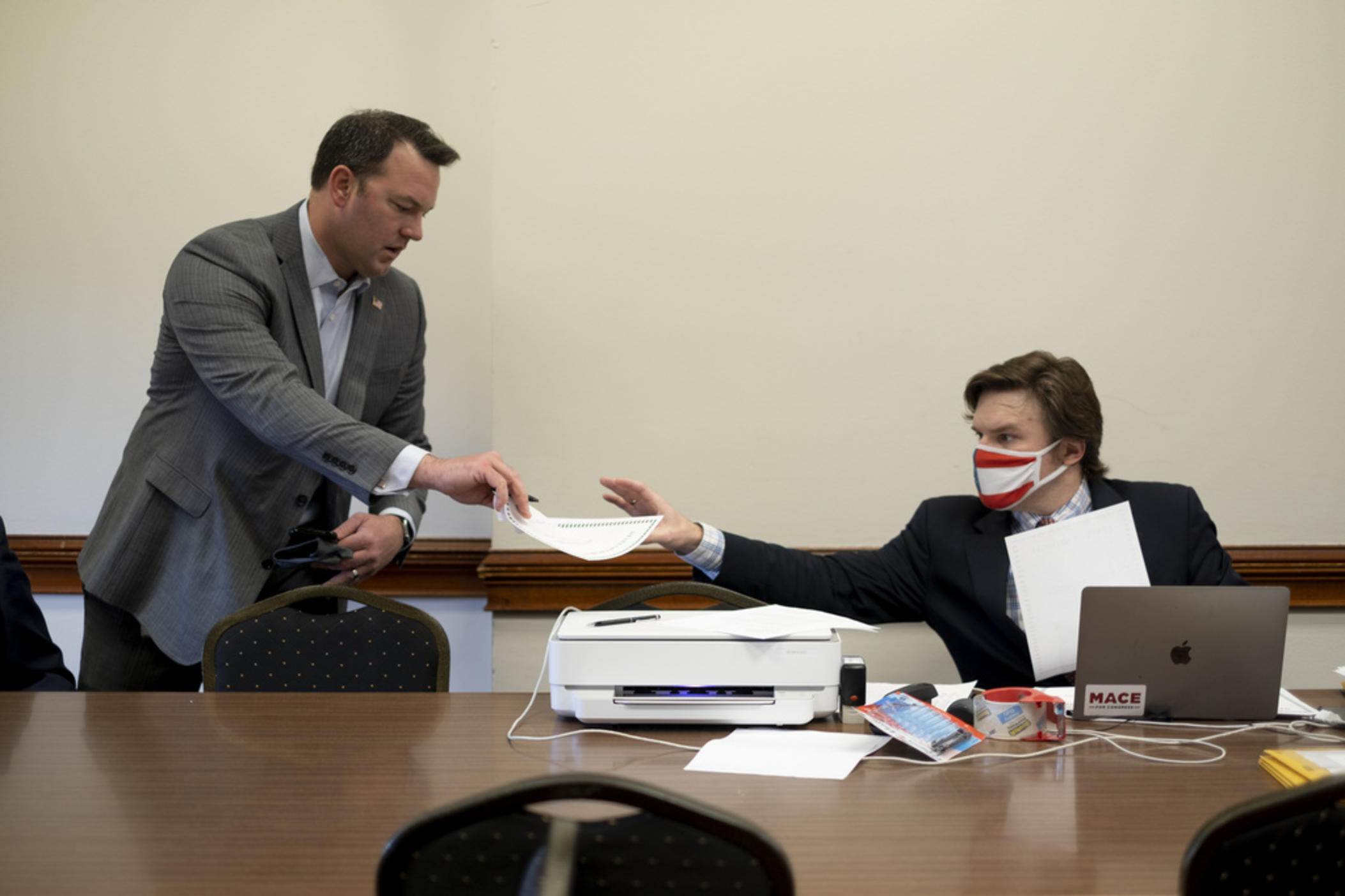 Georgia Republican Burt Jones, then a state senator and now lieutenant governor, hands in an electoral certificate claiming to be a duly chosen elector for Donald Trump on Dec. 14, 2020, at the Georgia Capitol in Atlanta. A lawsuit heard on Monday, Dec. 18, 2023, argued Jones should be disqualified from holding office in Georgia because of his actions as an elector.