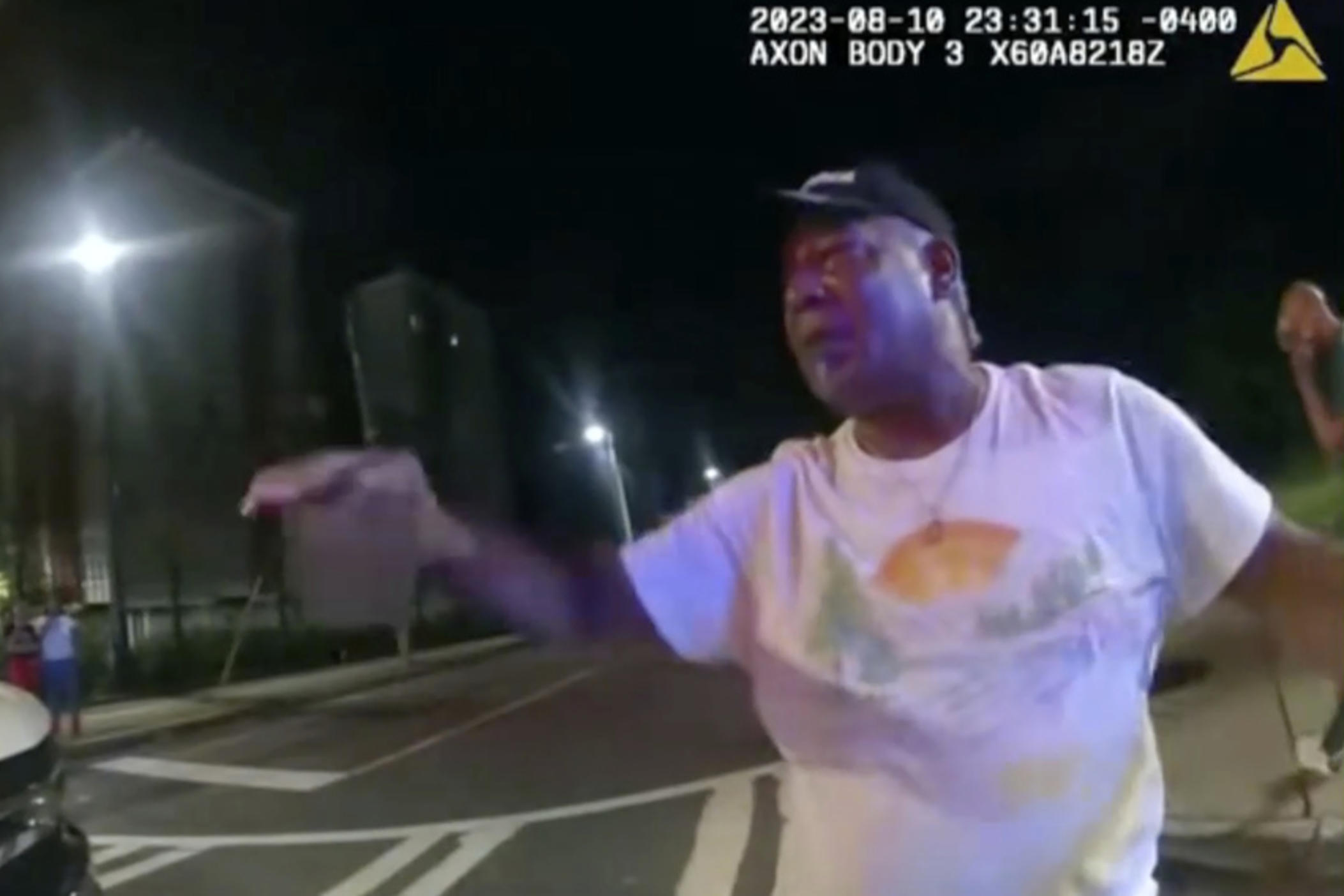 This image from bodycam video provided by the Atlanta Police Department shows Johnny Hollman Sr. speaking with Officer Kiran Kimbrough on Aug. 10, 2023 in Atlanta. The police officer responding to a minor car crash deployed a Taser on the church deacon who disregarded multiple commands to sign a traffic ticket, shocking the man after he repeatedly said he could not breathe, police body camera video released Wednesday, Nov. 22, 2023 shows. Hollman Sr. became unresponsive during his arrest and later died.