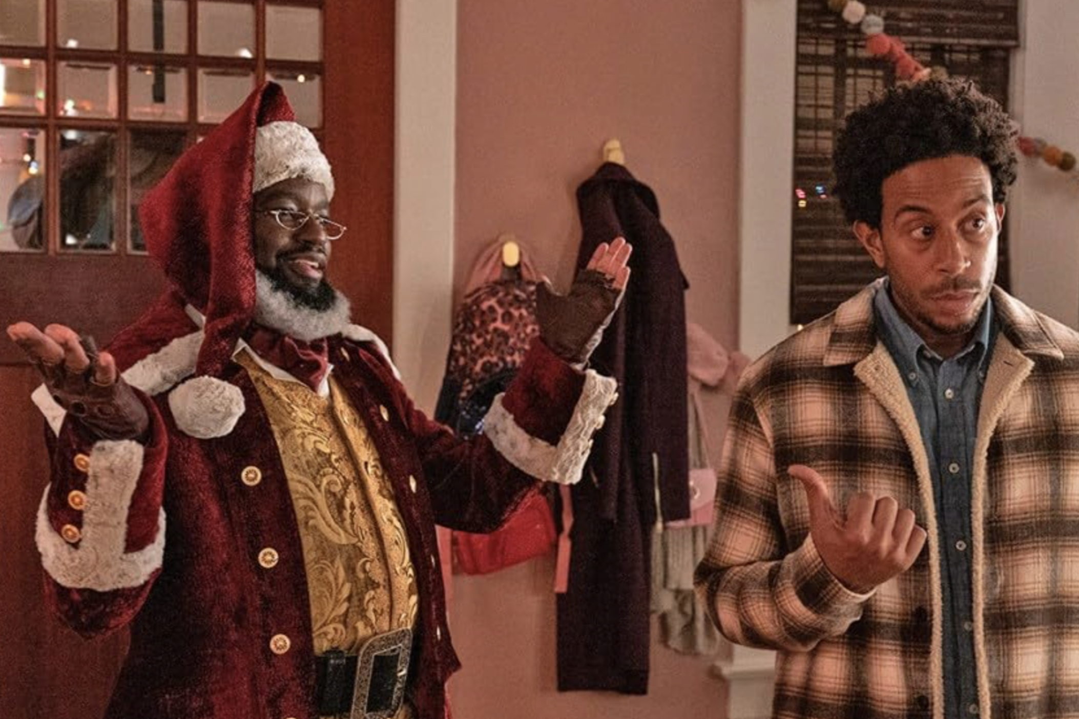 Lil Rel Howery (left) and Ludacris star in the Disney+ holiday film "Dashing Through the Snow," which was filmed in Atlanta and released Nov. 17, 2023.