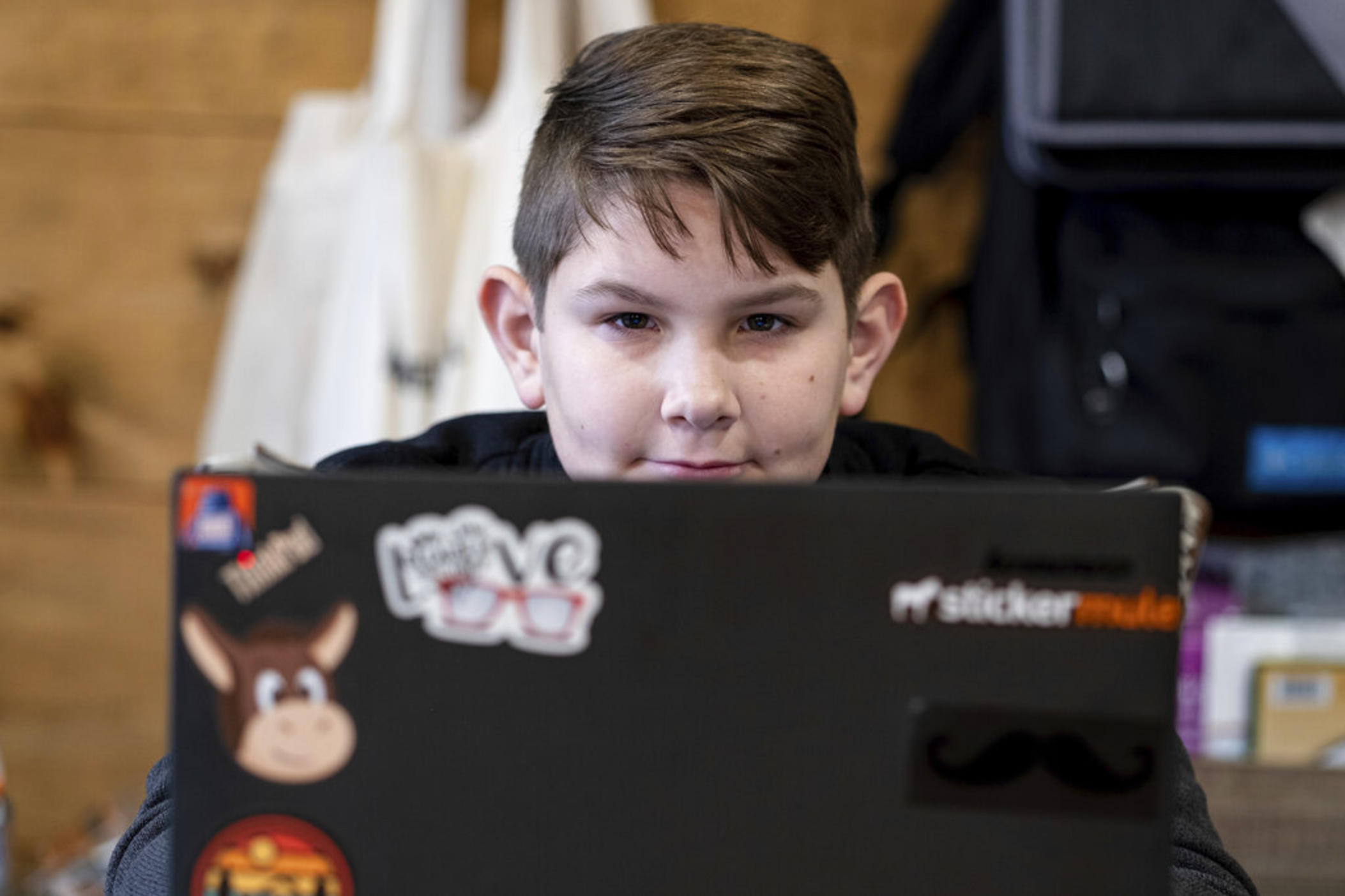 Tate Rivera is photographed at his home in Roswell, Ga., Friday, Feb. 12, 2021. Kelli Rivera is hoping a voucher bill passes that will help pay for her to move her son out of a public Cobb County school and into a private school.