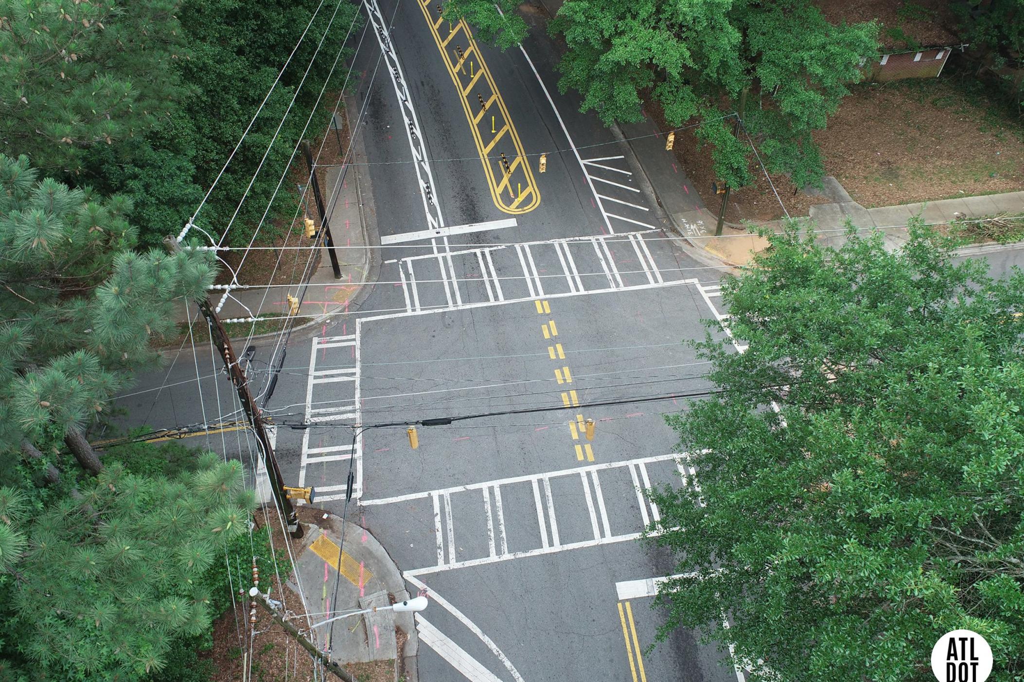An overview of a intersection that's well painted with bike lines and cross walks. A new bill from Atlanta City Council aims to decrease traffic deaths with safer intersections and support from the Atlanta Department of Transportation.