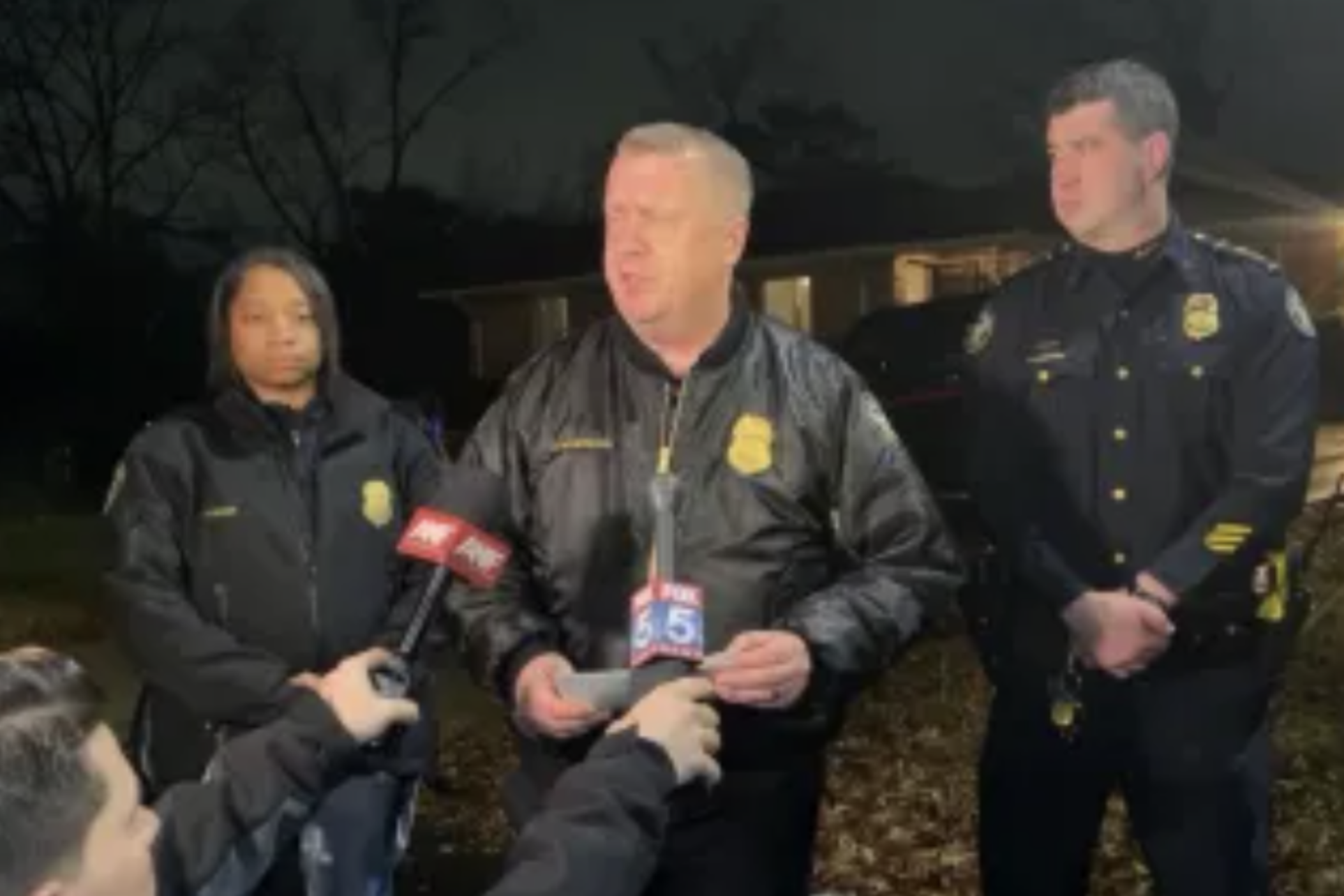Atlanta Police Department officers are shown at the scene of a patrol car burned outside an officer's home in Lakewood Heights.