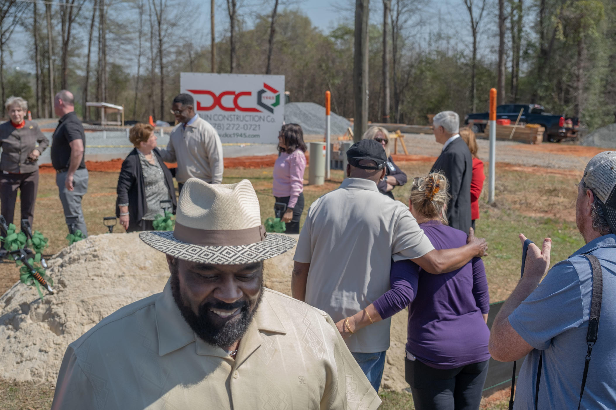 Community members and local leaders of Jeffersonville, Ga., gather at the groundbreaking of an expansion to the federally qualified health center in town.