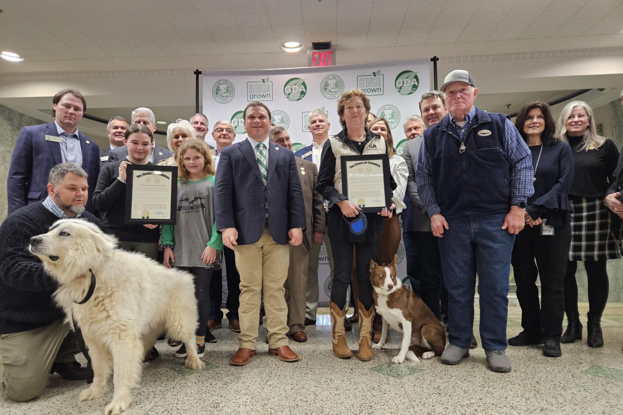 Agriculture Commissioner Tyler Harper, Lt. Gov. Burt Jones and about a dozen members of the legislature were on hand to congratulate Skippy and Casper.