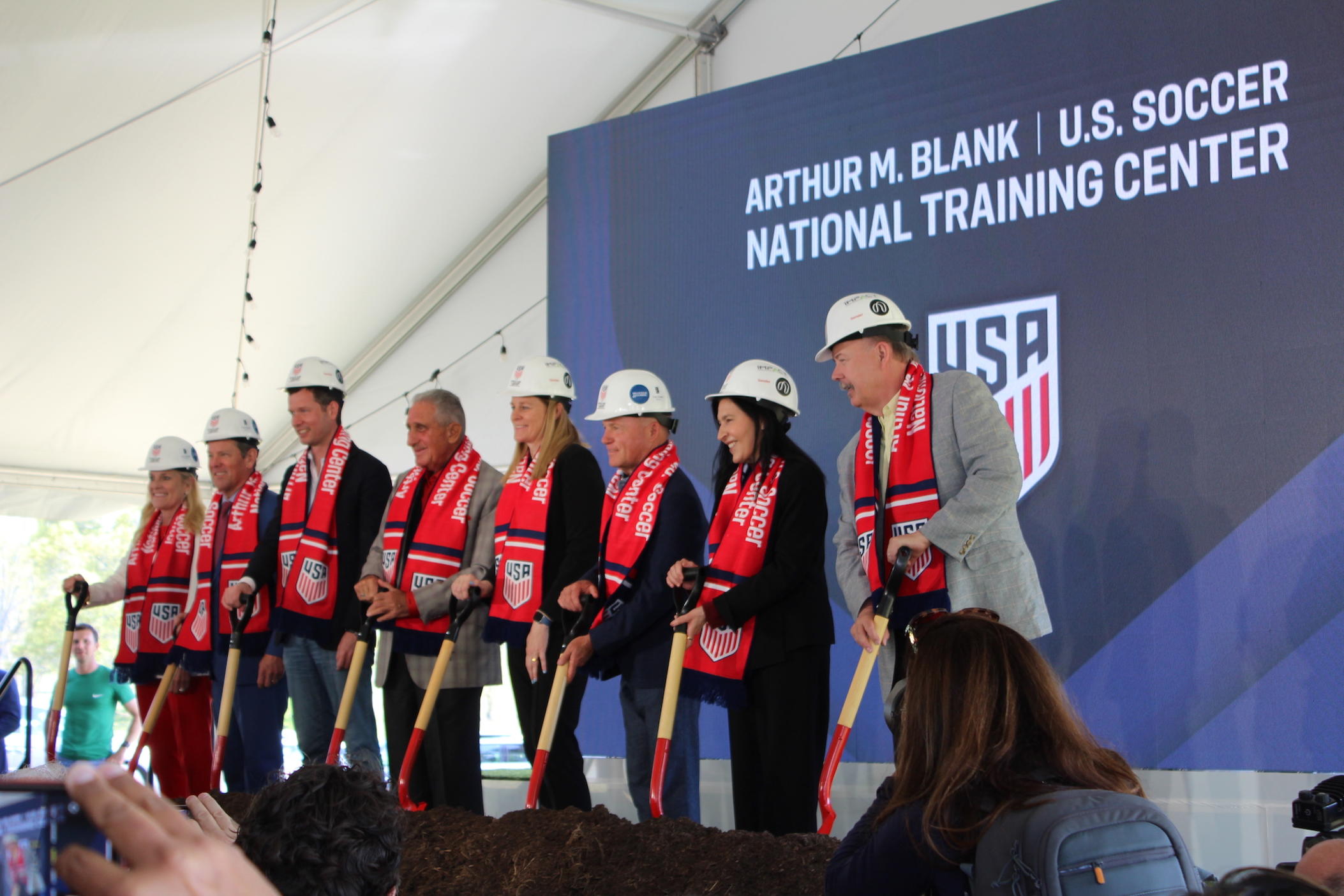 From left to right: Marty Kemp, Georgia Gov. Brian Kemp, US Soccer CEO JT Batson, Arthur Blank, US Soccer President Cindy Parlow Cone, Chick-Fil-A Chairman Dan Cathy and other executives break ground on the new National Training Center in Fayette County, Ga., on April 8, 2024. 