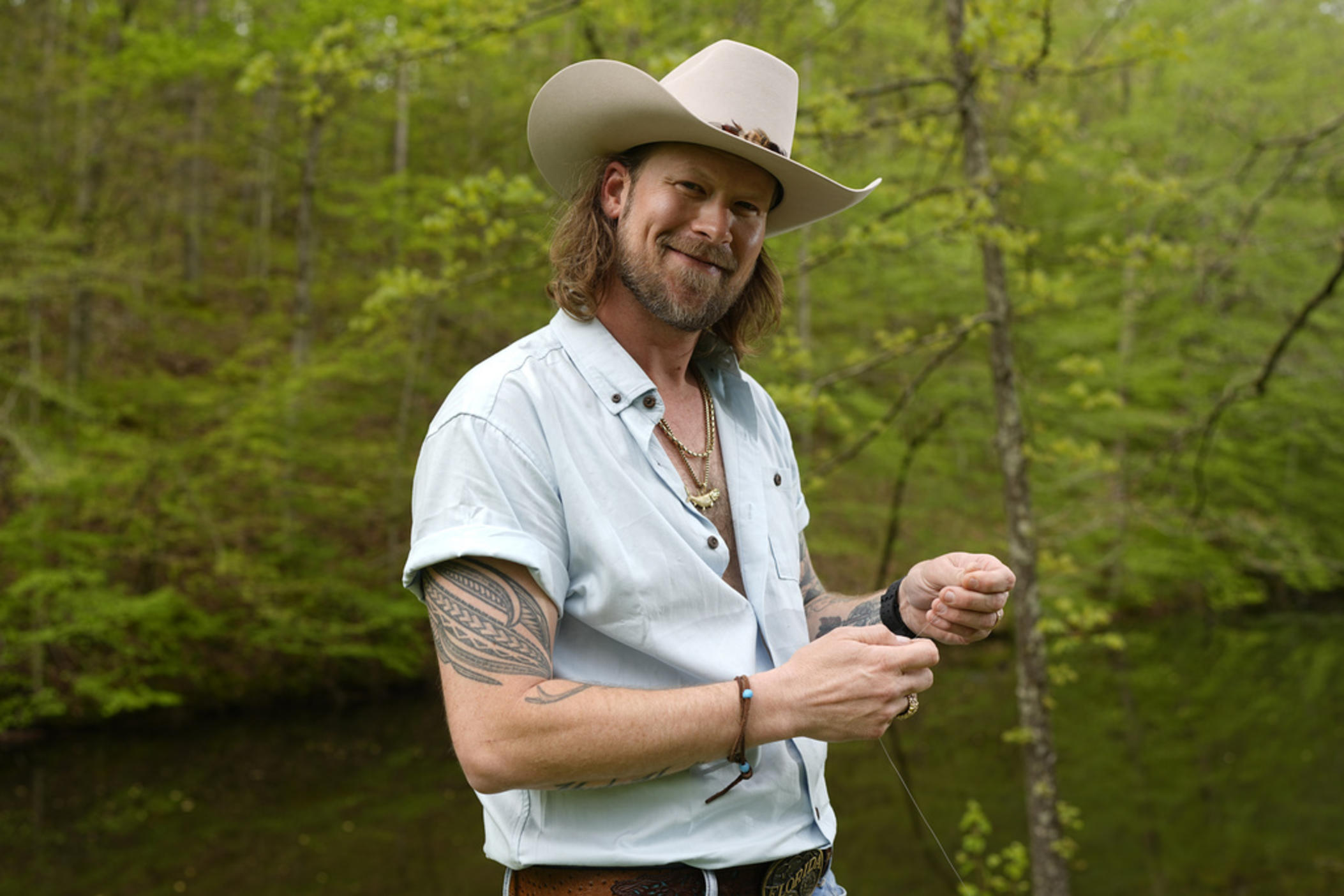 Brian Kelley poses for a portrait outside his cabin Wednesday, April 17, 2024, in Nashville, Tenn.
