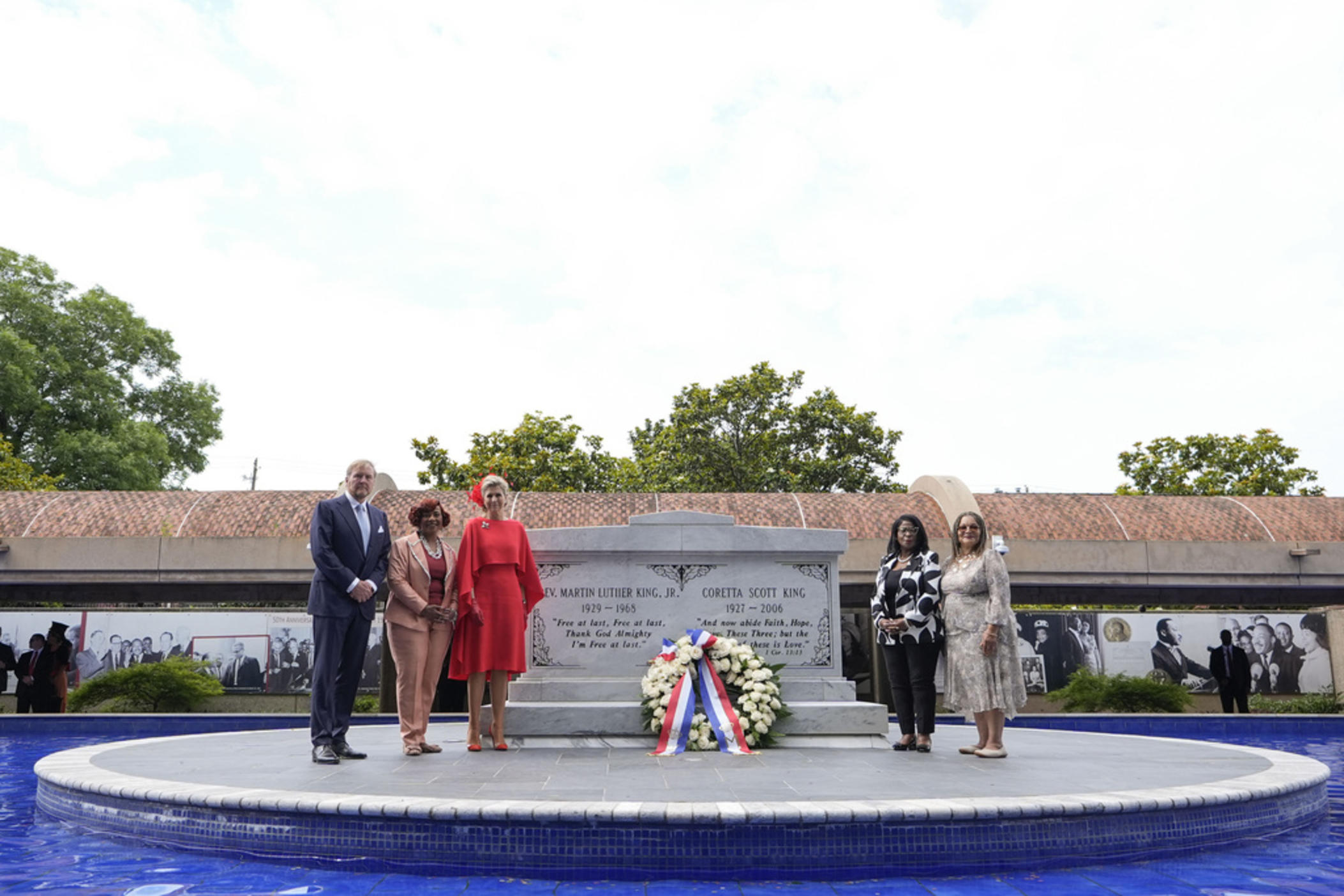 From left to right, King Willem-Alexander, King's daughter Bernice King and Queen Maxima of the Netherlands, pose for a photograph after placing a wreath at the tombs of Martin Luther King Jr., and Coretta Scott King, during a visit to the King Center, Monday, June 10, 2024, in Atlanta. (AP Photo/Brynn Anderson)