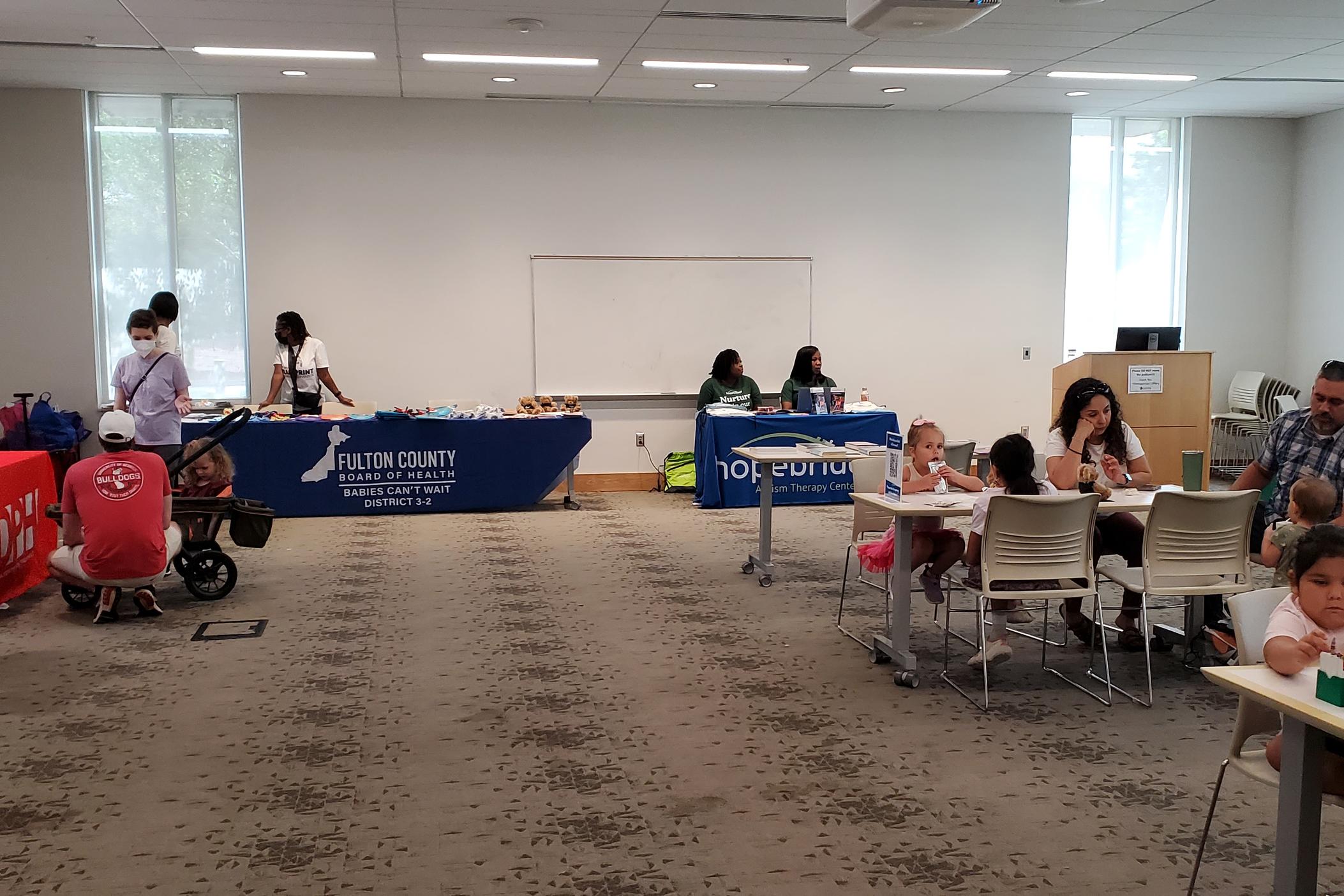 People meet organizations at the Sensory Friendly Family Meetup