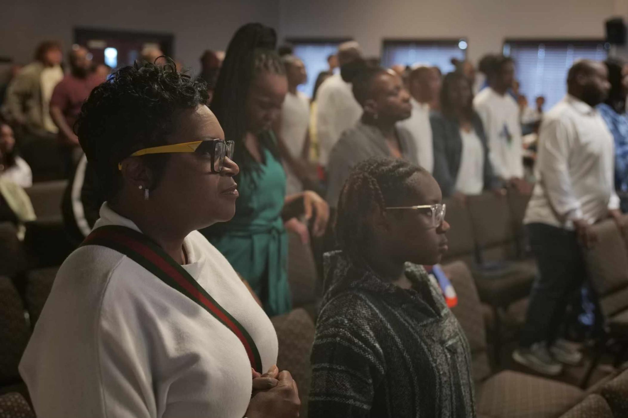 Dr. Fayron Epps watches services at Destiny Christian Center International, a nondenominational church in Fayetteville, Ga.