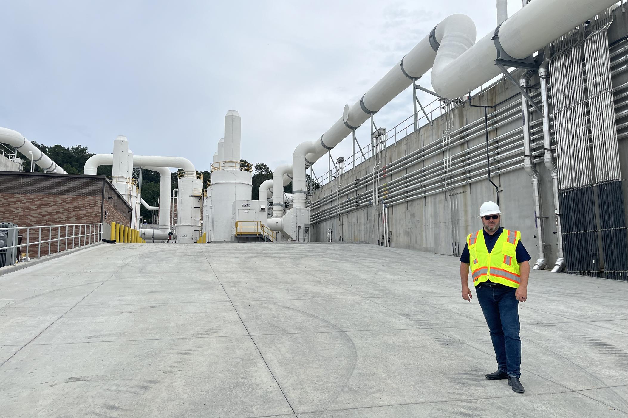 Fulton County's director of Public Works David Clark stands in front of the upgraded water treatment plant at Big Creek Water Reclamation Facility on September 6, 2024.
