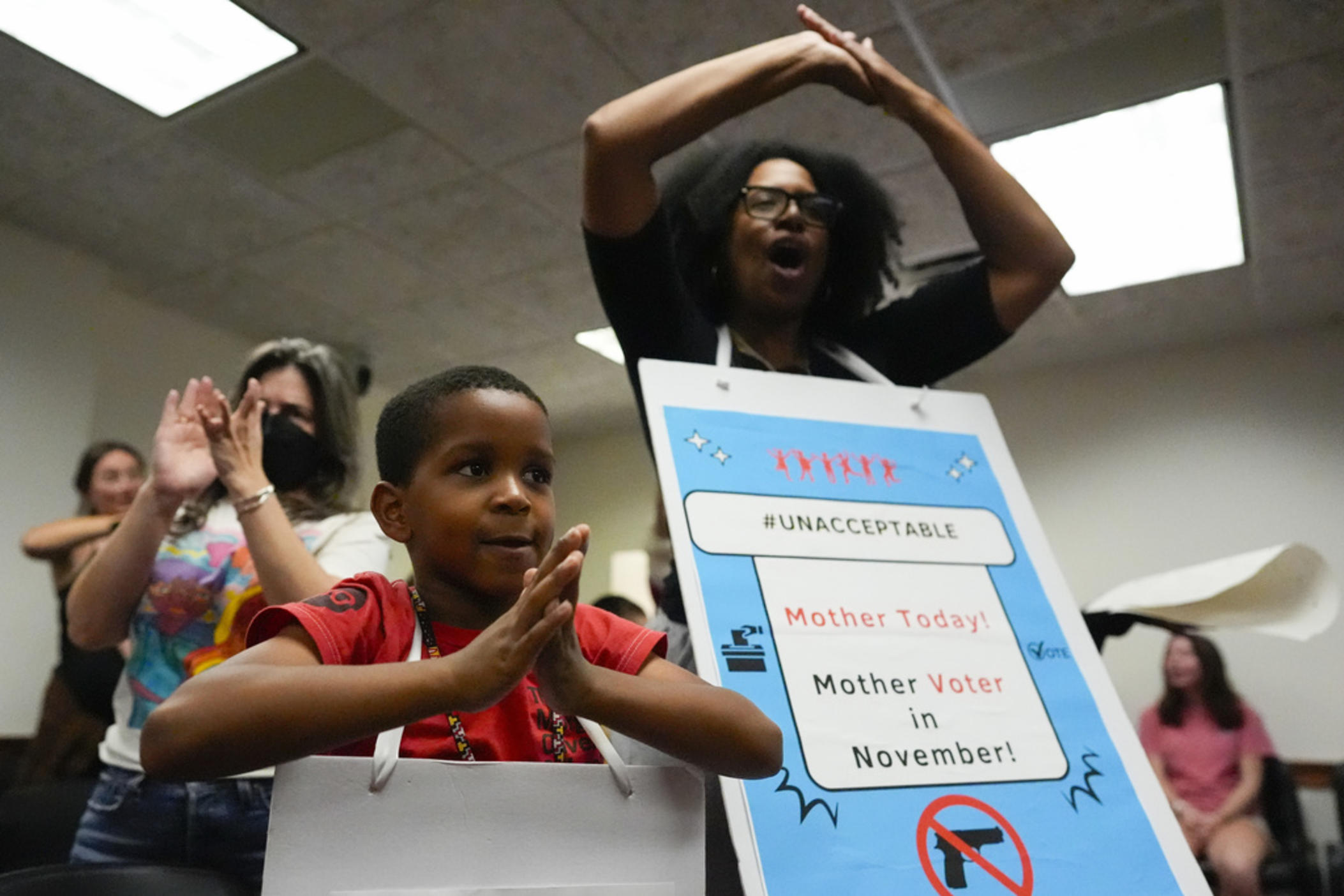 Parents and children speak in a meeting at the state Capitol, where children spoke to legislators about gun violence, Thursday, Sept. 19, 2024, in Atlanta. 