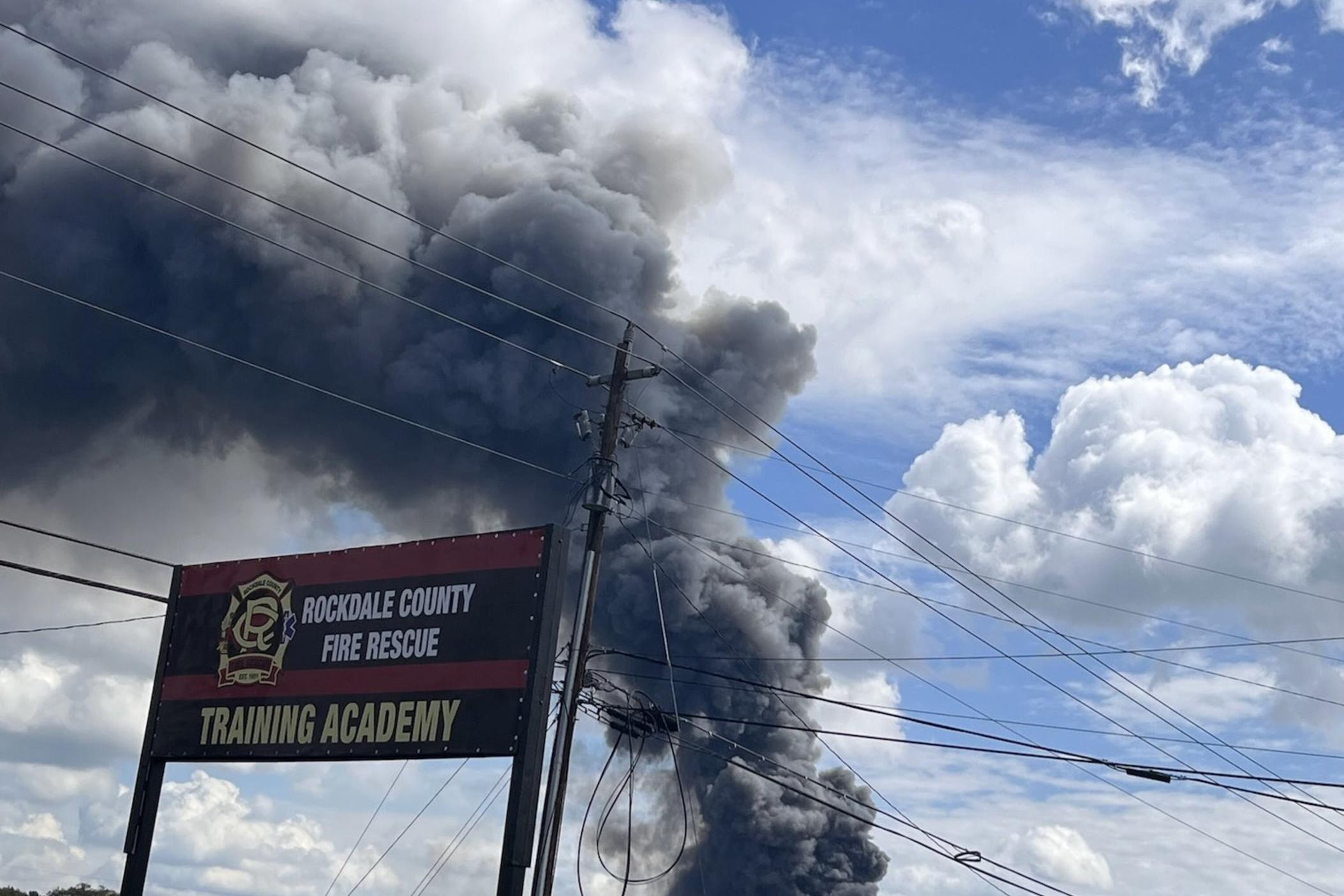 Some residents east of Atlanta were evacuated and others told to shelter in place after a fire at a chemical plant.