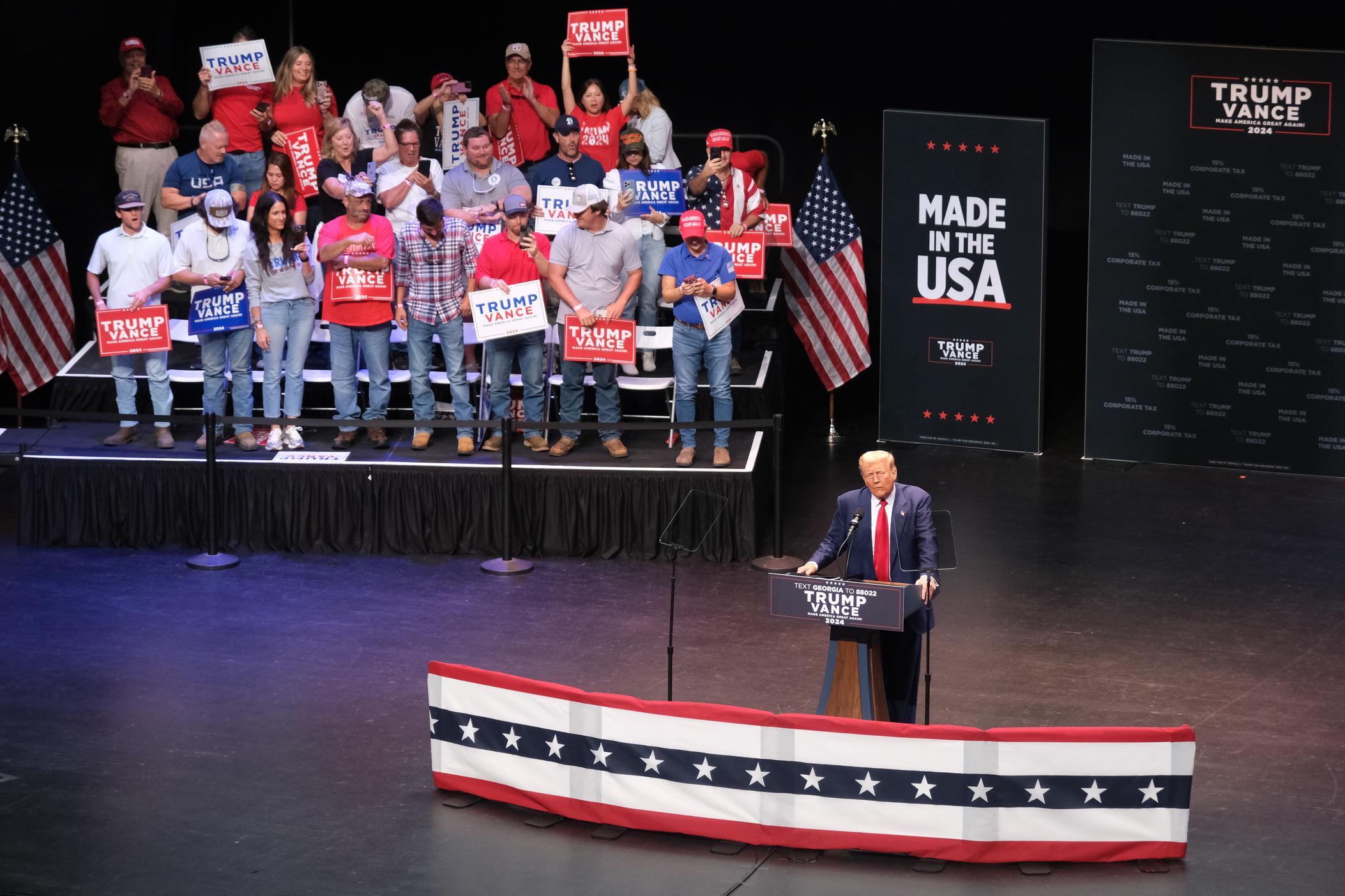 President-elect Donald Trump speaks at a campaign rally at the Johnny Mercer Theatre in Savannah on Sept. 24, 2024.