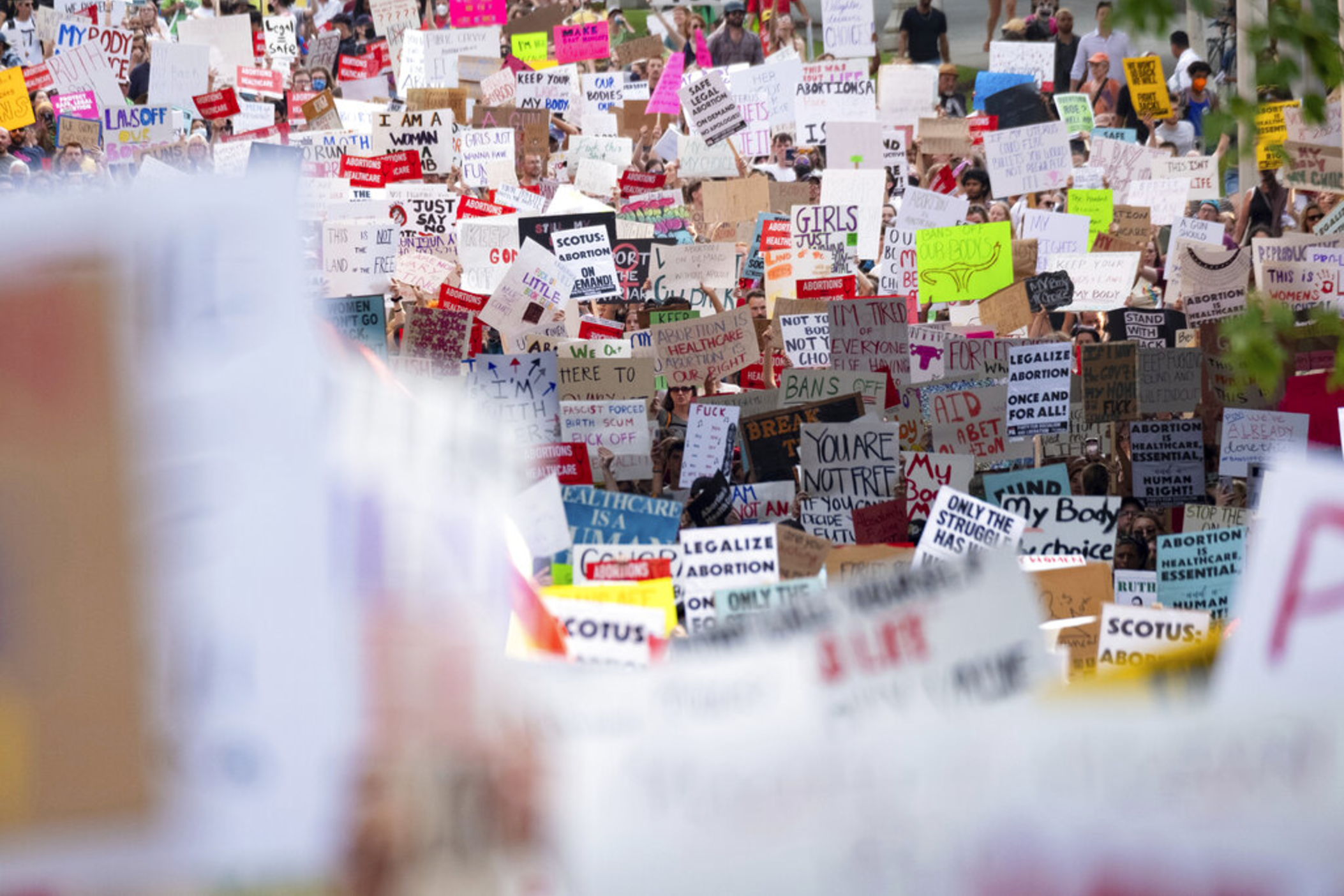 People march through Downtown Atlanta on Friday, June 24, 2022, to protest the Supreme Court's decision to overturn Roe v. Wade. The Supreme Court on Friday stripped away women’s constitutional protections for abortion, a fundamental and deeply personal change for Americans' lives after nearly a half-century under Roe v. Wade. The court’s overturning of the landmark court ruling is likely to lead to abortion bans in roughly half the states.