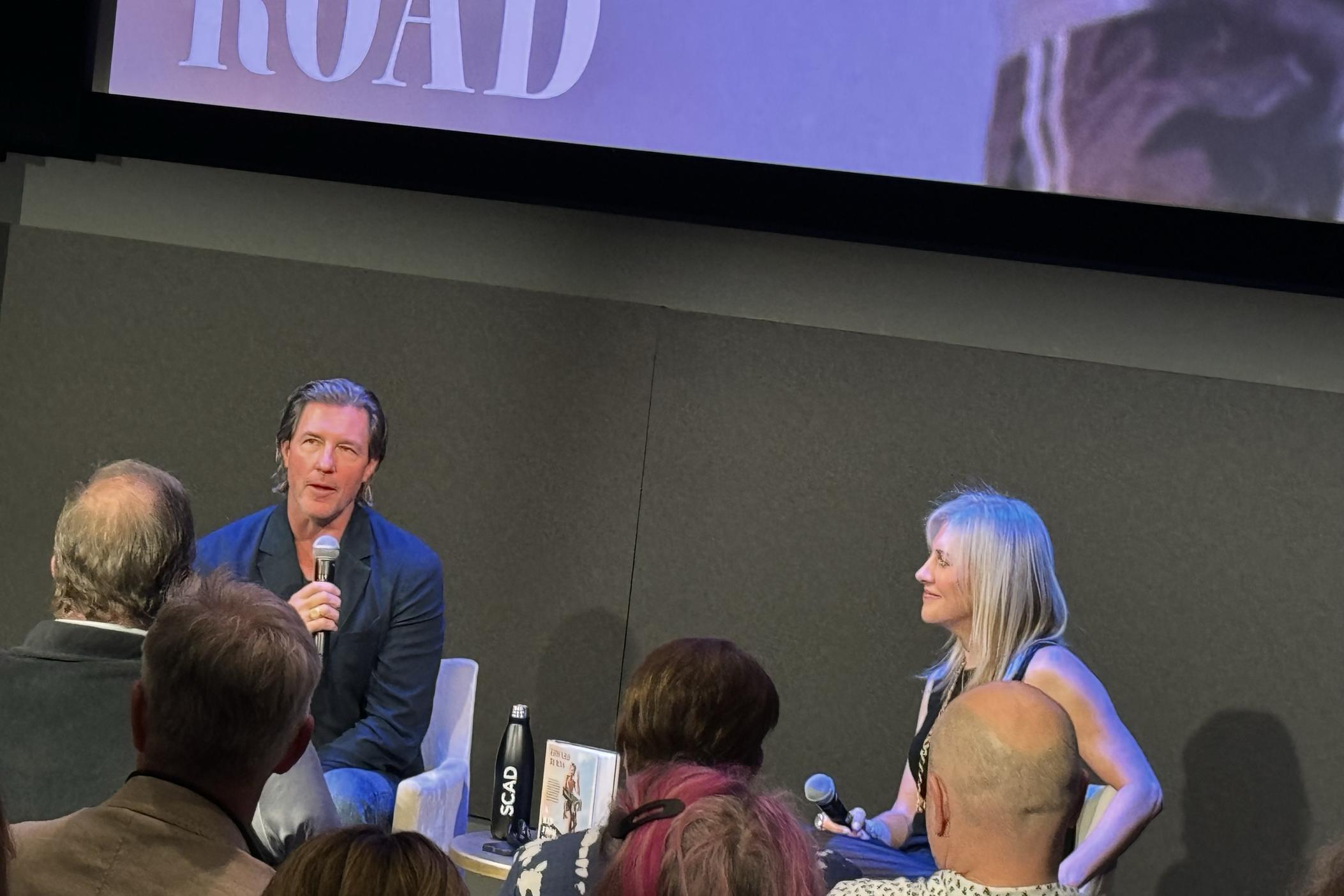 Actor, filmmaker and author Edward Burns (left) and Atlanta-based author Emily Giffin speak at SCAD Show on Oct. 2, 2024.