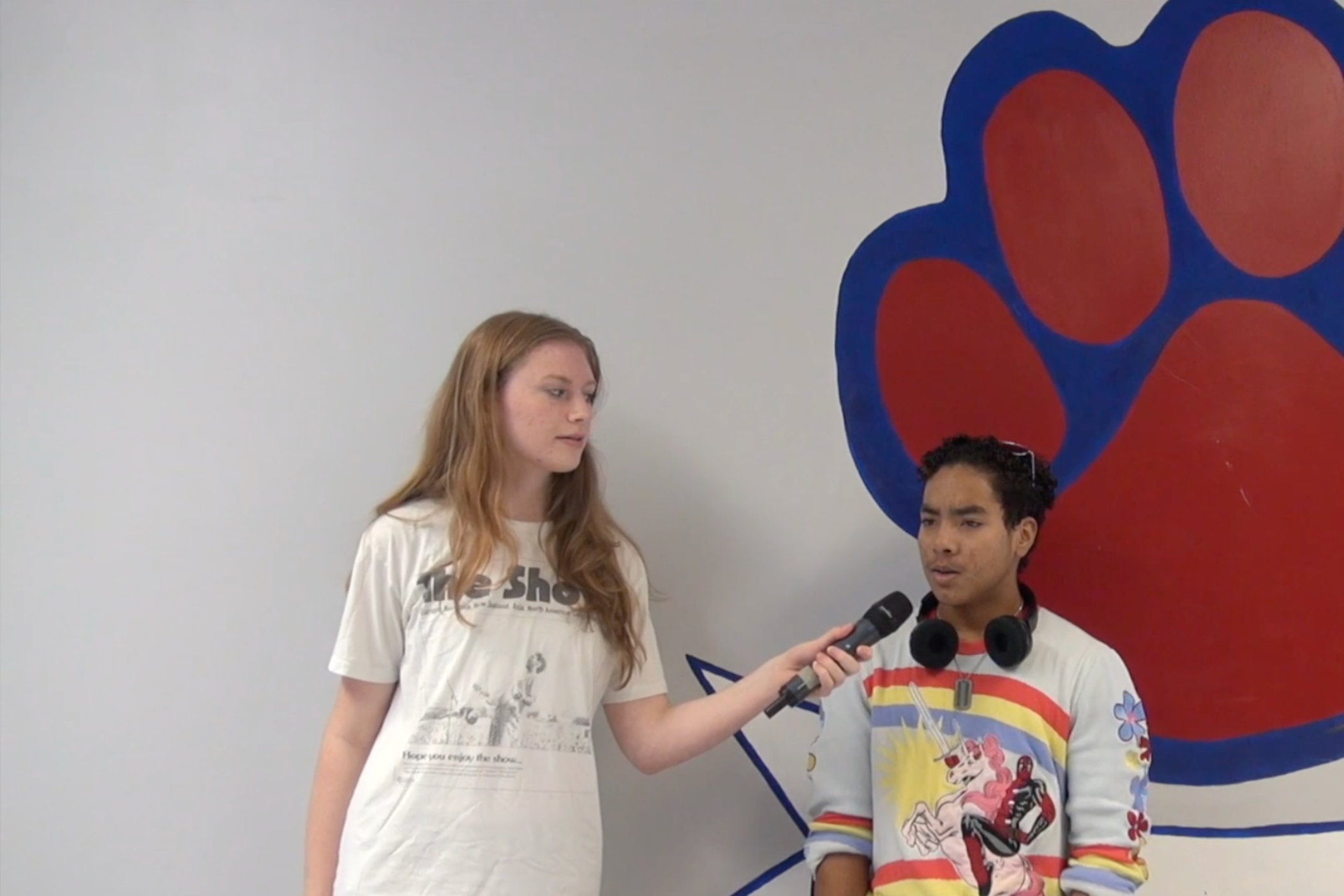 Dunwoody High School student Alexandra Evans interviews students who are eligible to vote about why they feel their vote matters in the upcoming election. Screenshot