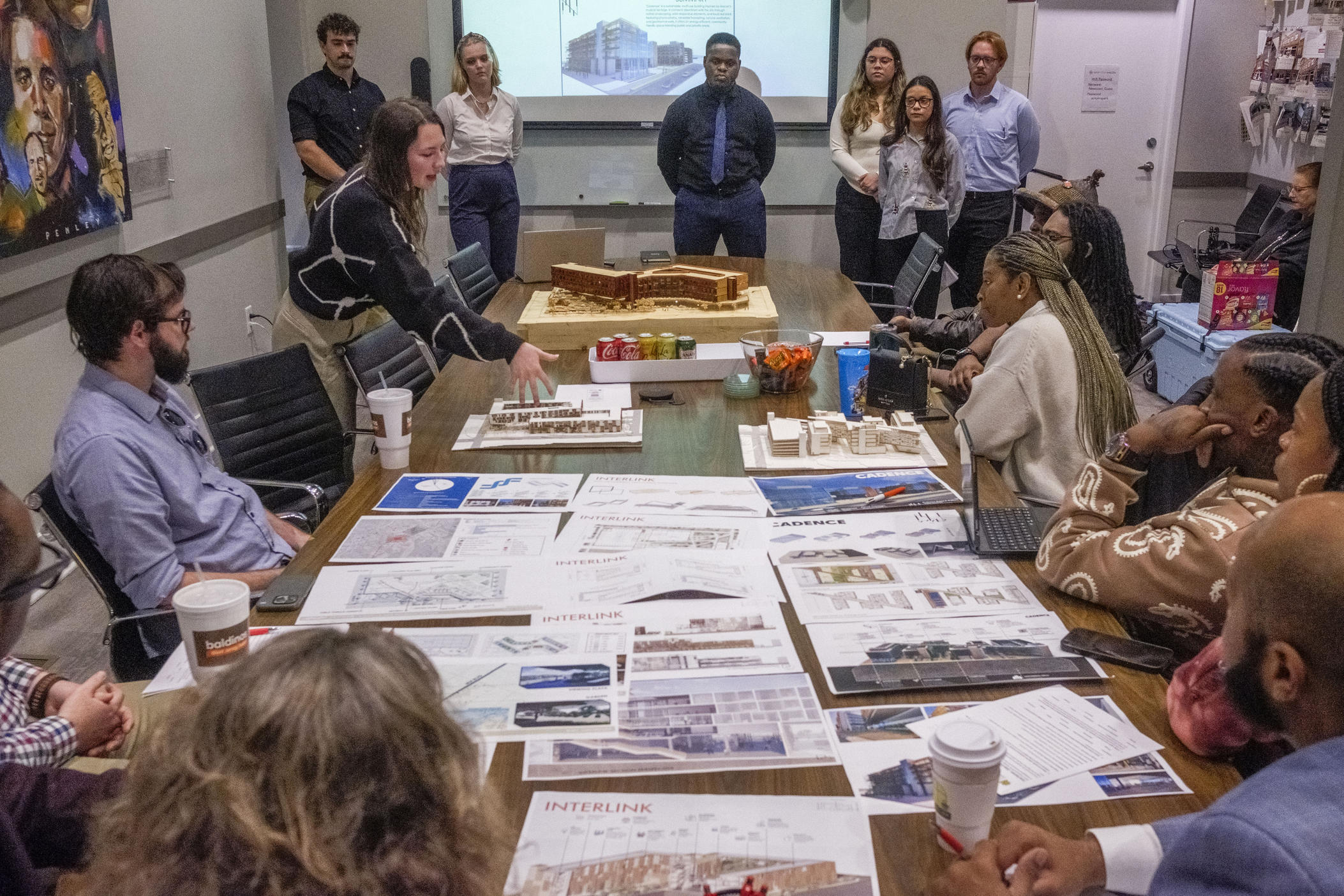 Kennnesaw State University architecture students present their final designs for a mixed use development in Macon's Greenwood Bottom neighborhood to residents and community leaders recently. 