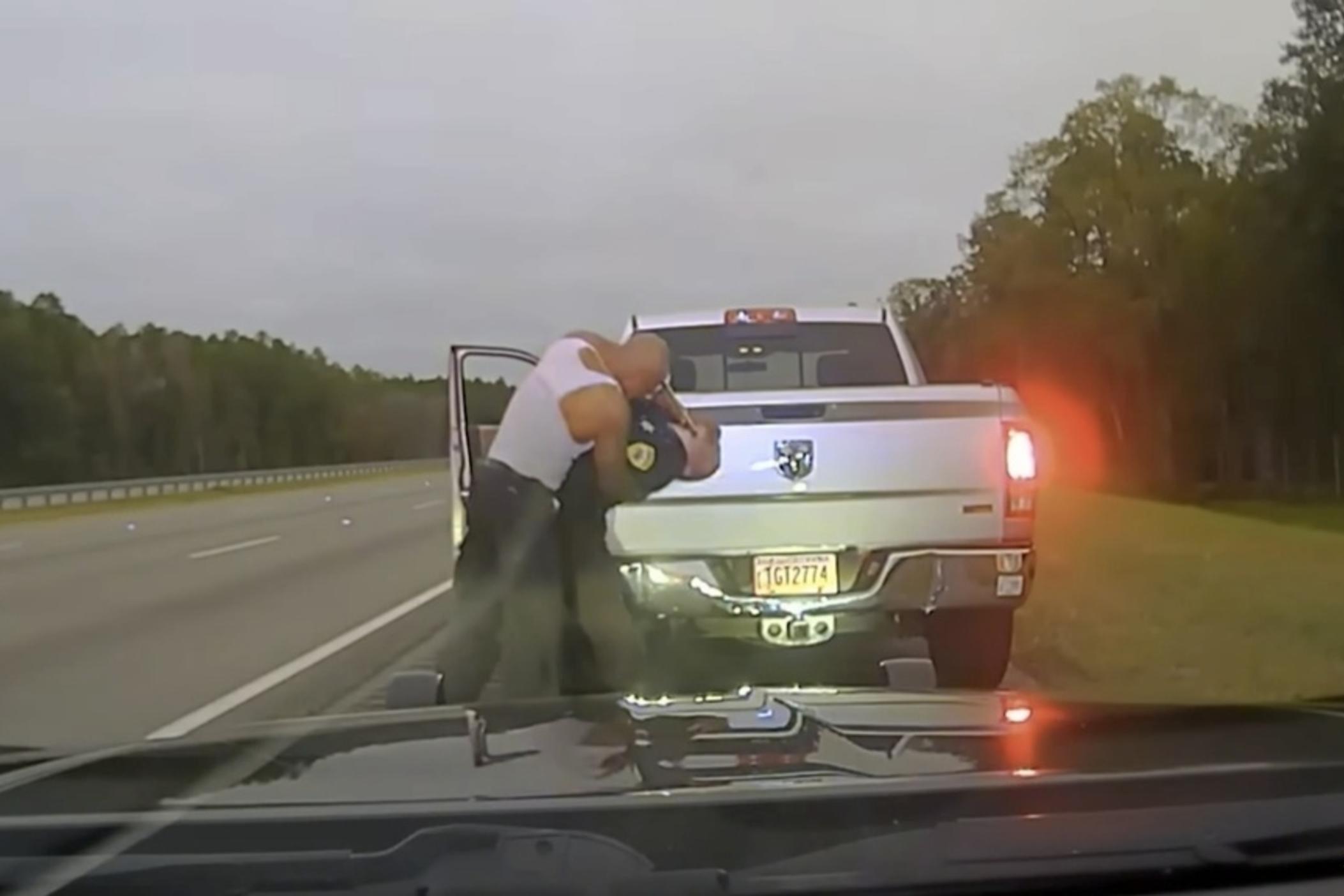 This still image provided by Camden County Sheriff's Office shows the police dash camera video of a traffic stop involving a sheriff's deputy and Leonard Cure on Monday, Oct. 16, 2023, in Camden County, Ga. 