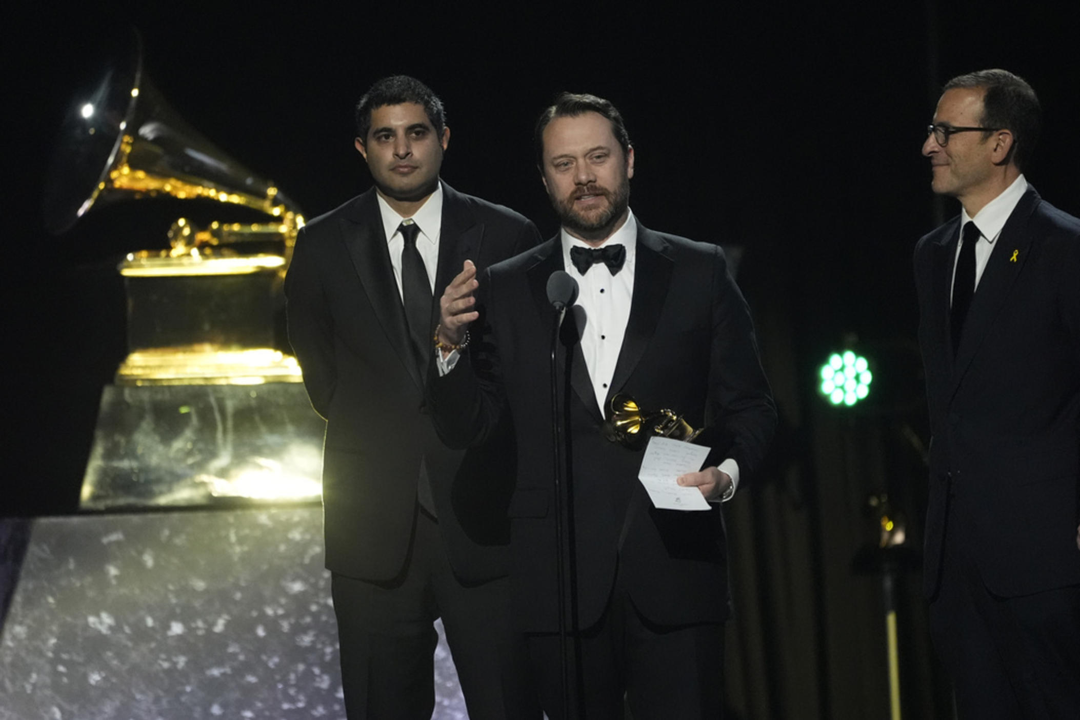 Kabir Sehgal, left, and Jason Carter accepts the award for best audiobook, narration, and storytelling recording for "Last Sundays in Plains: A Centennial Celebration" during the 67th annual Grammy Awards on Sunday, Feb. 2, 2025, in Los Angeles. 