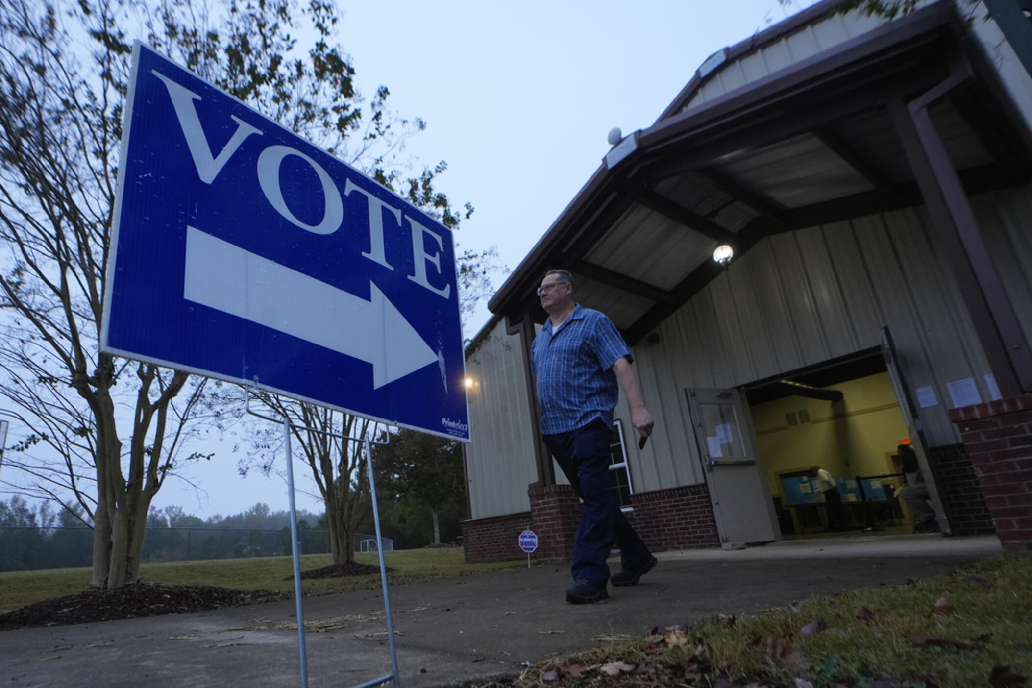 A voter leaves a polling location after voting Tuesday, Nov. 5, 2024 in Rutledge, Ga. 
