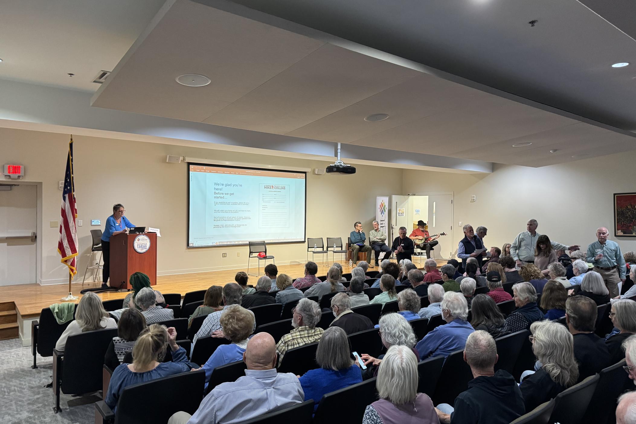 300 people filled an auditorium and two overflow rooms at the Athens Clarke County Library for a town hall meeting on March 18, 2025.