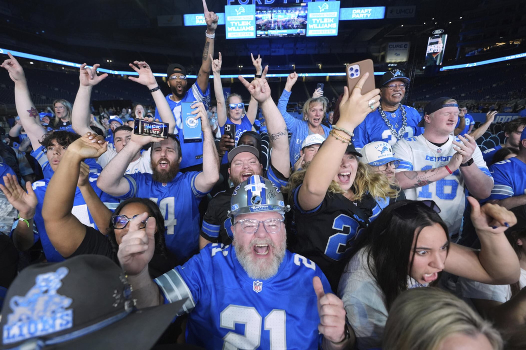 Detroit Lions fans attend an NFL football draft night party at Ford Field in Detroit, Thursday, April 24, 2025. 