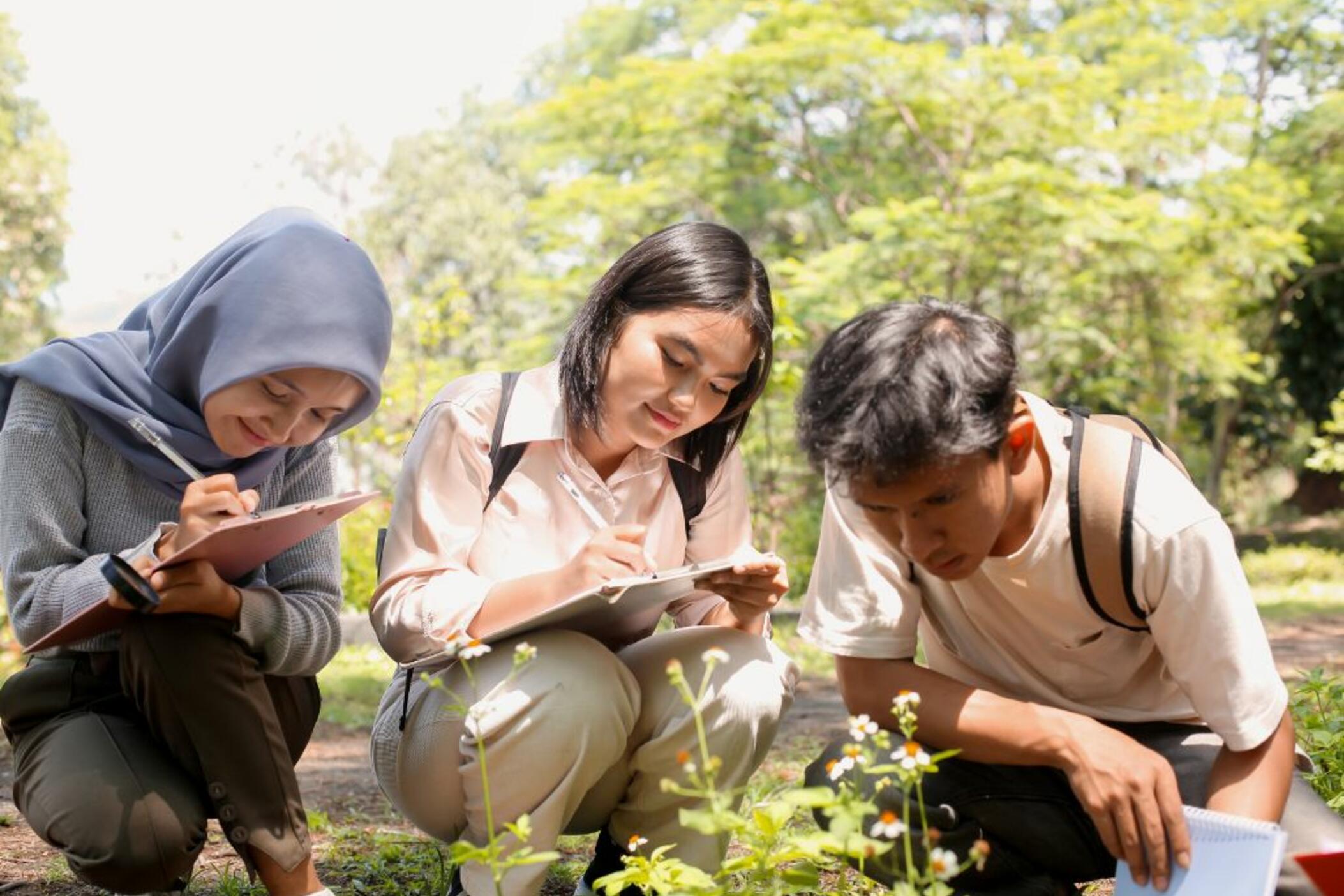 Students examine nature.