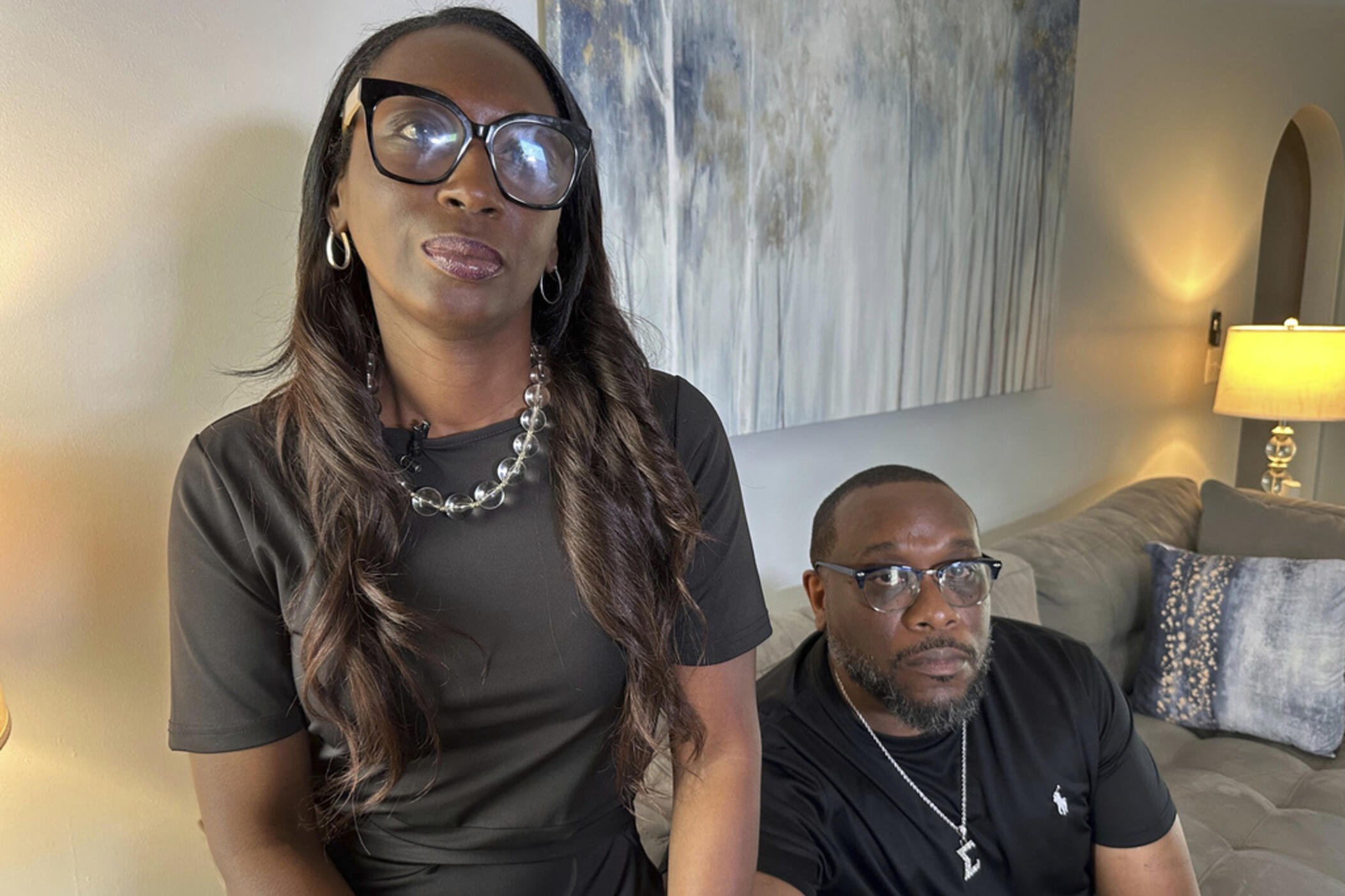 Trina Martin, left, and Toi Cliatt sit for a portrait inside the home the FBI mistakenly raided in 2017, in Atlanta on Friday, April 25, 2025.