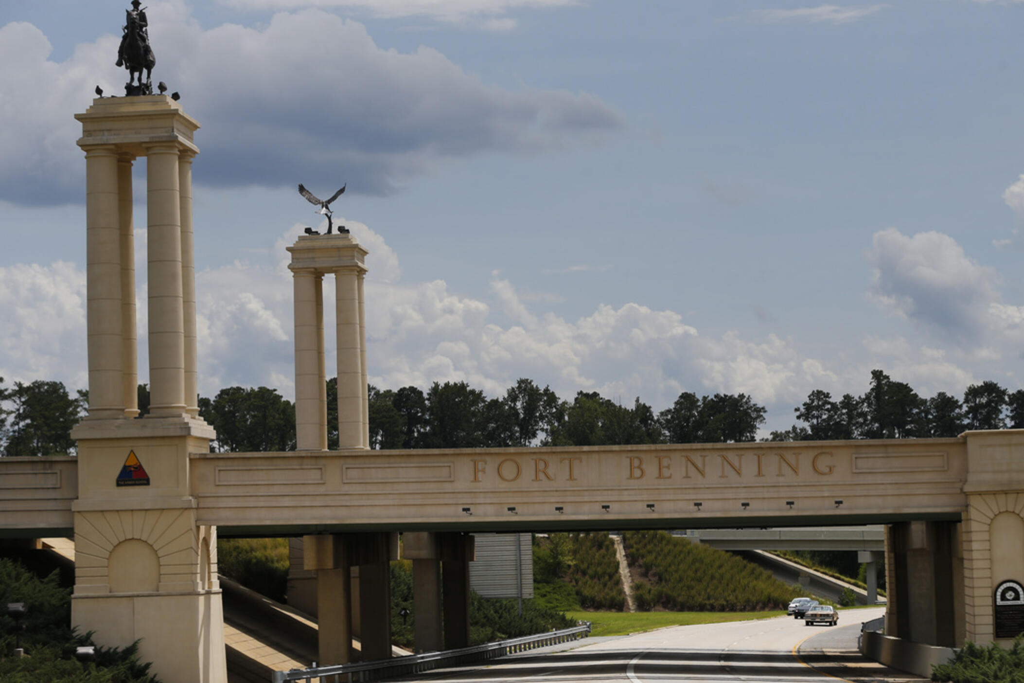 A bridge over I-185 marks the entrance to the U.S. Army's Fort Benning in Columbus, Ga., Aug. 21, 2015. 