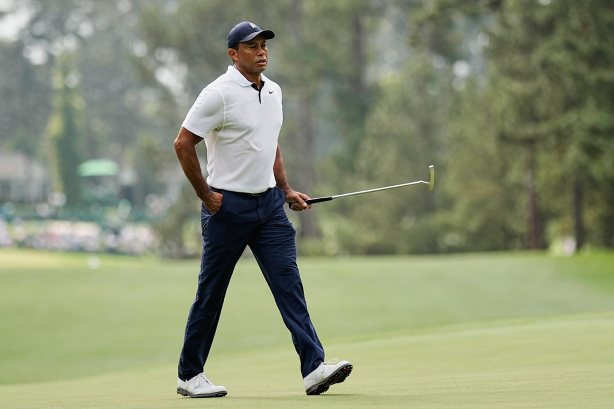 Tiger Woods walks on the first hole during the first round of the Masters golf tournament at Augusta National Golf Club on Thursday, April 6, 2023, in Augusta, Ga.