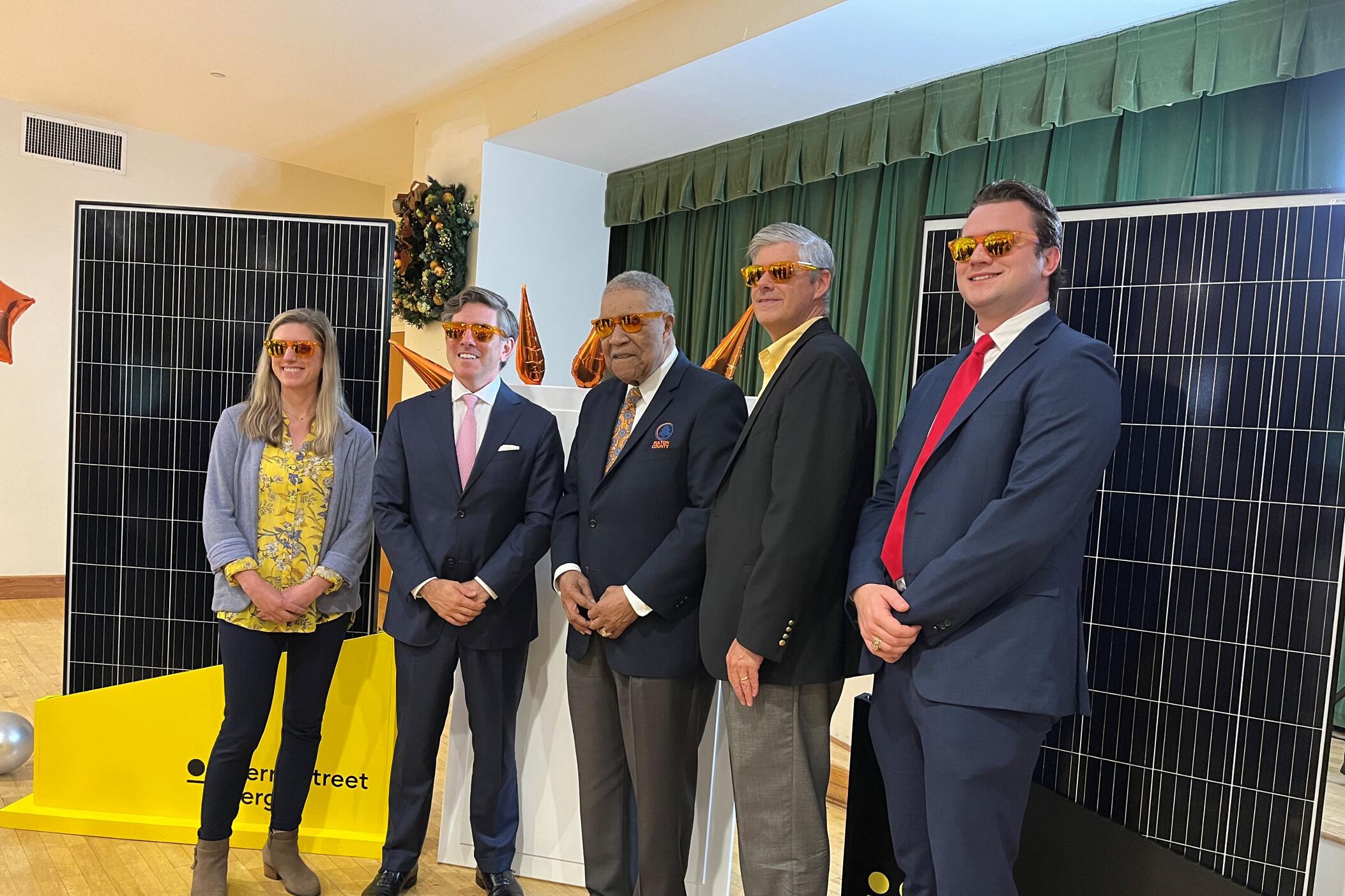Leaders from Fulton County gathered to take a picture with the new solar panels including (from left to right) Jessica Lavender, Michael Chanin, Rob Pitts, and Bob Ellis.