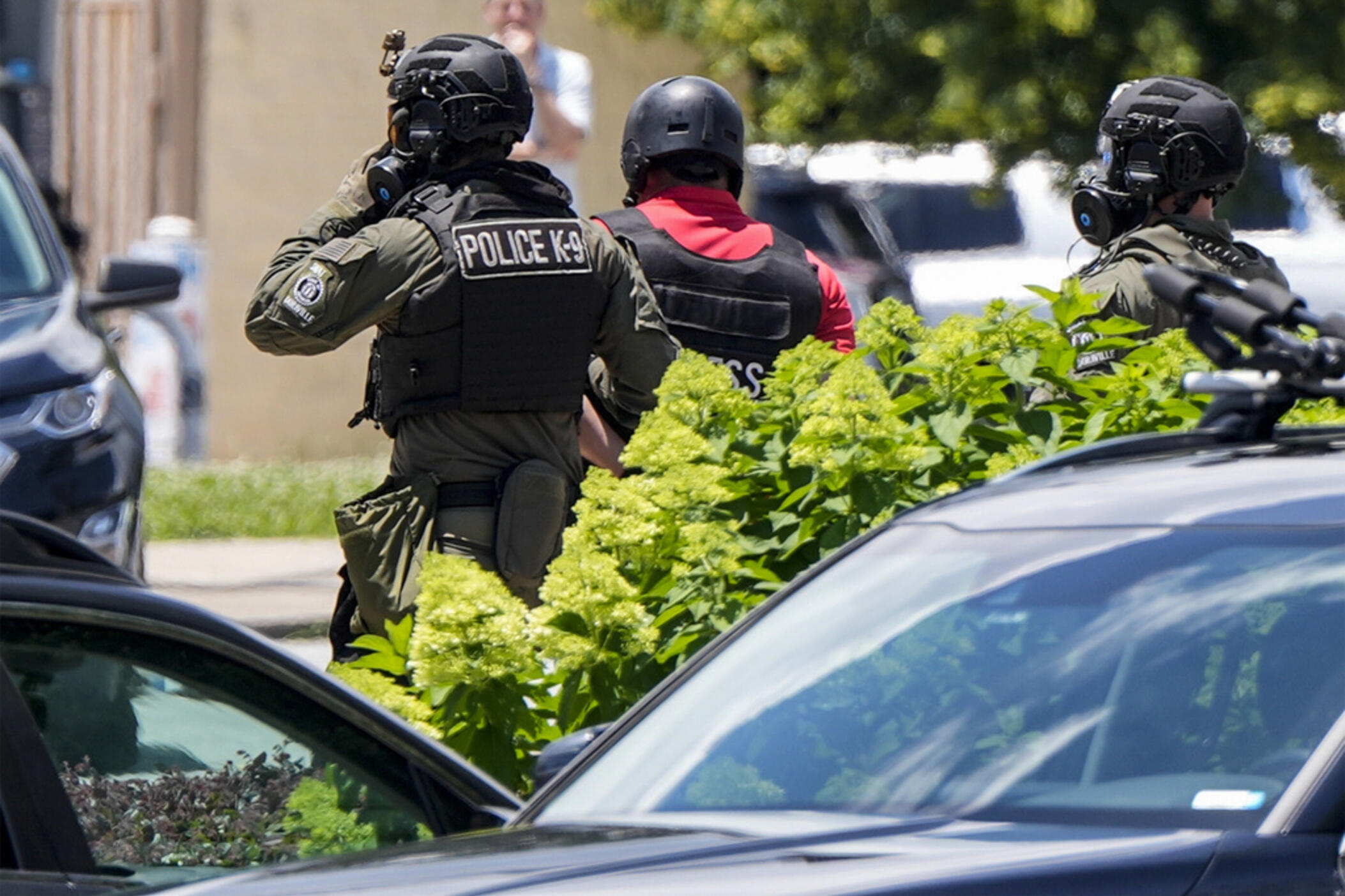 Mario Guevara with MGNews is detained by Dekalb County Sheriff's deputies in Dekalb County, during a "No Kings" protest near Atlanta, on Saturday, June 14, 2025.