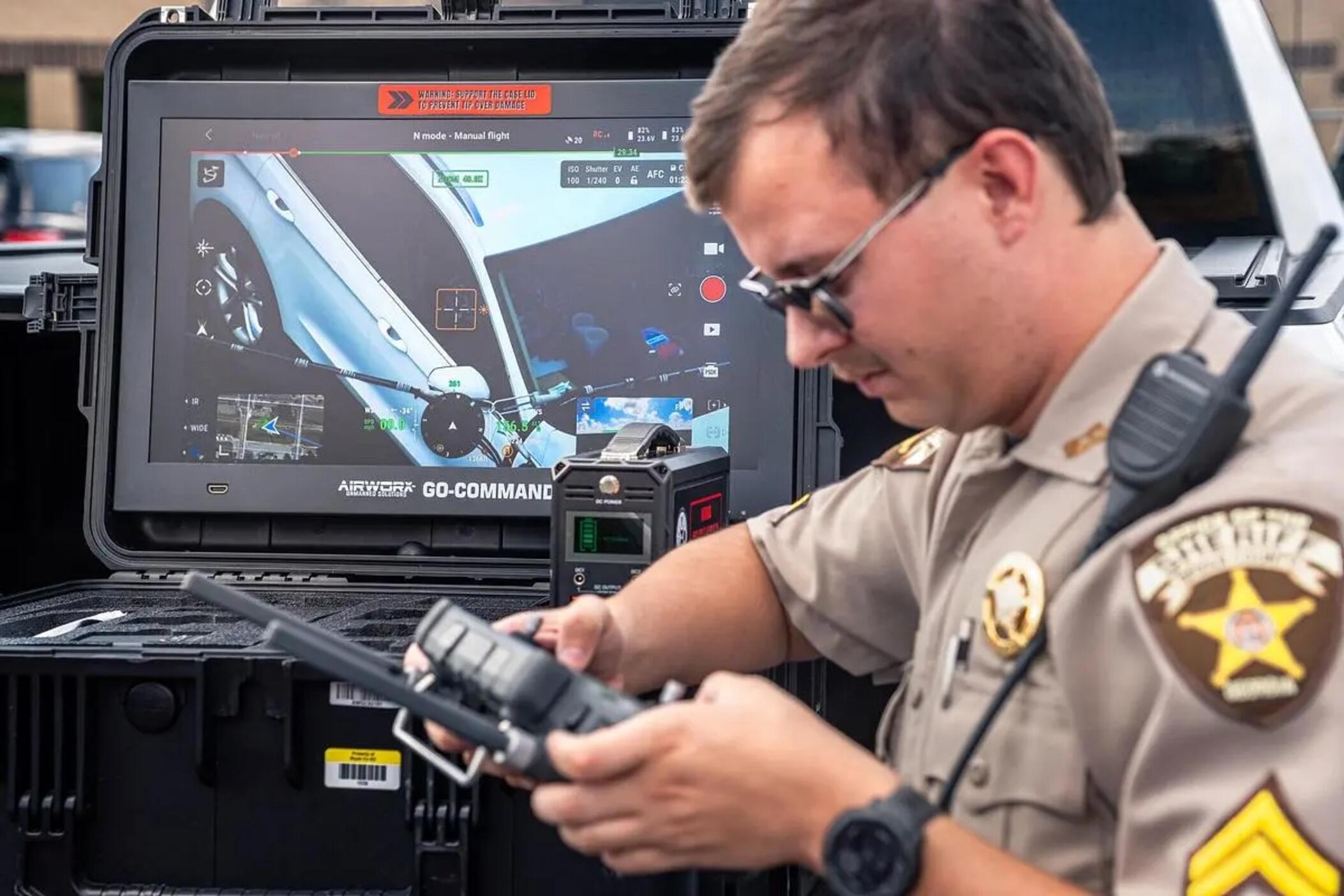 Bryan County Sheriff’s Office Deputy Campbell Grieninger performs a DJI Matrice 30T drone owned by the Sheriff’s department in Pembroke on June 19, 2025.The drone is used for search and rescue operations, as well as observing traffic violations. Credit: Justin Taylor/The Current GA/CatchLight Local