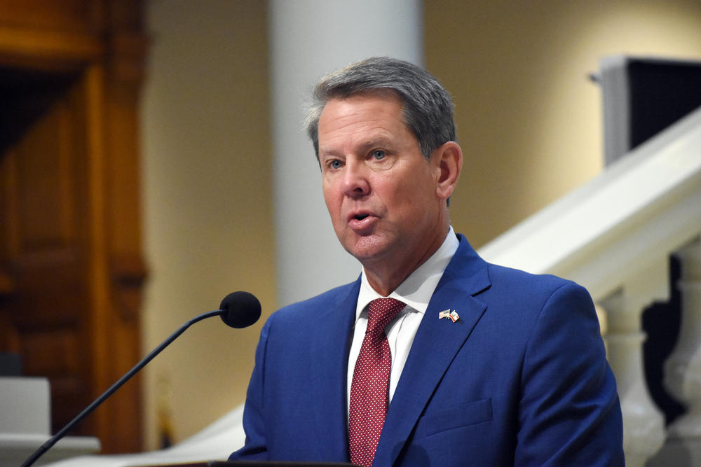 Gov. Brian Kemp speaks at a press conference.