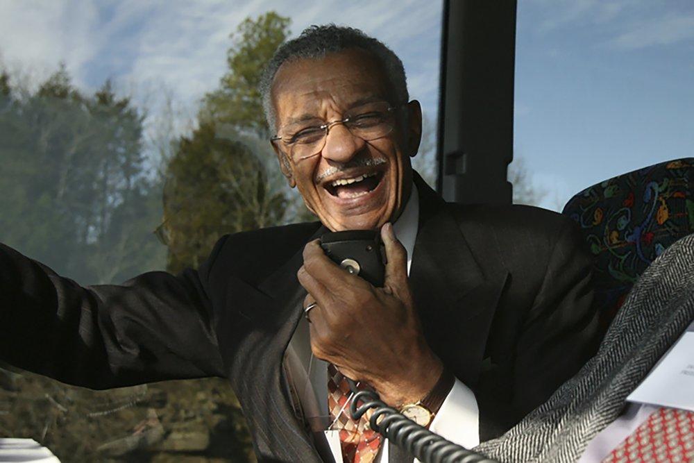 FILE - In this Jan. 27, 2007, file photo, C.T. Vivian uses an intercom with Rev. James Lawson on a bus in Montgomery, Ala., to discuss the experiences they encountered in 1961 as Freedom Riders, a group of college students who defied segregation on interstate buses across the American South. 