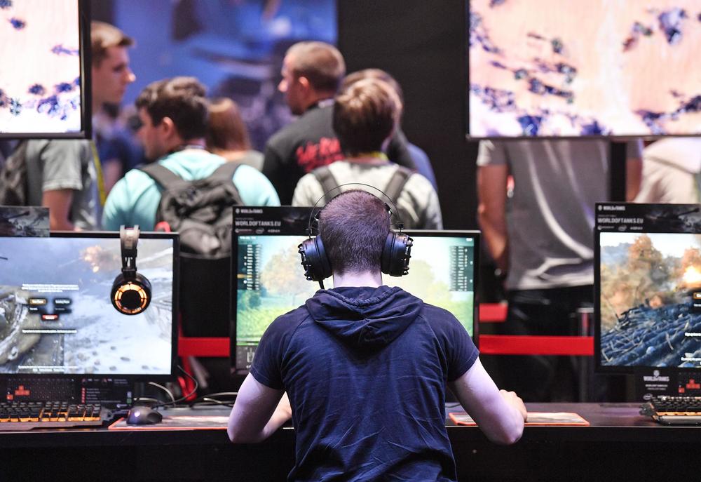A boy plays video games at Gamescom, Europe's biggest video game event, which is taking place in Cologne, Germany, this week.