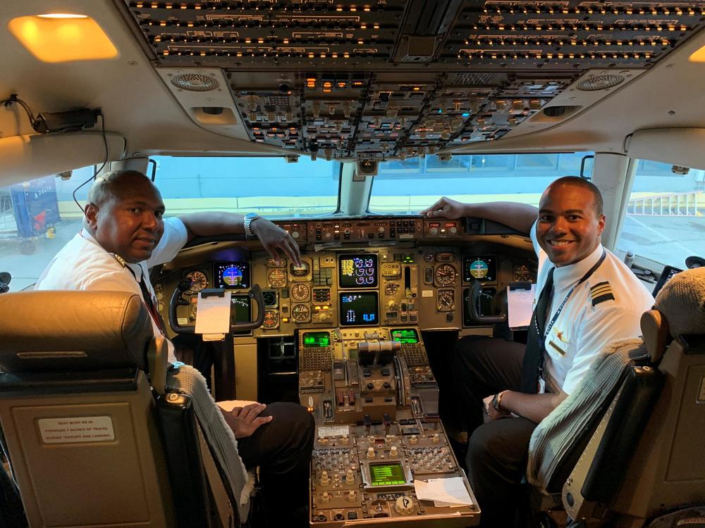 Captian Guy Stallworth and Jerome Wellens pilot in the cockpit of the "Dream Flight"
