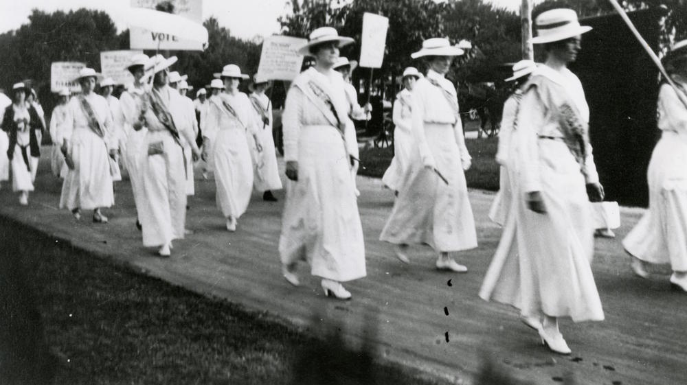 Mrs. Anne Dallas Dudley leads a march.