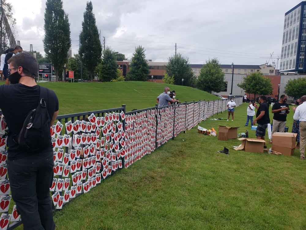 The COVID-19 "memorial wall" erected Thursday night at the National Center for Civil and Human Rights in downtown Atlanta.