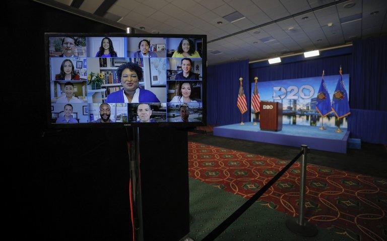 Stacey Abrams, who came within a whisker of becoming Georgia's governor in 2018, joined other elected party officials Tuesday to deliver a split screen keynote on the second night of a 2020 Democratic National Convention that was supposed to bring crowds to Milwaukee. 