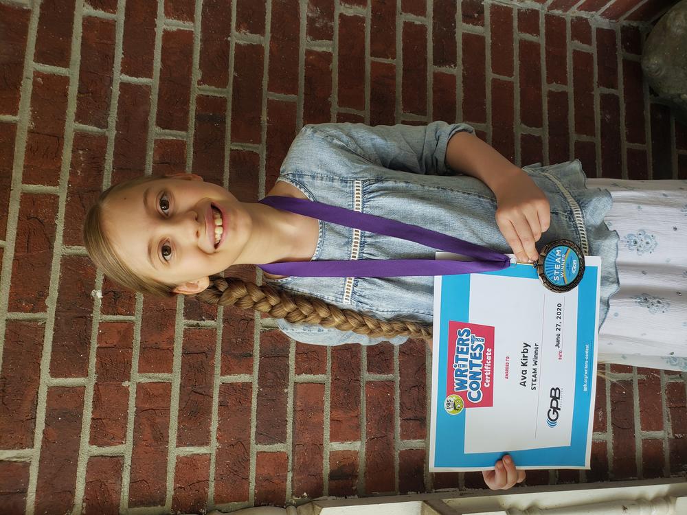 Ava with awards