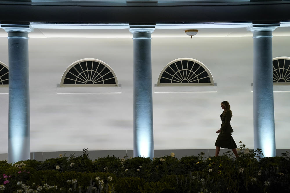 Melania Trump walks around the White House.