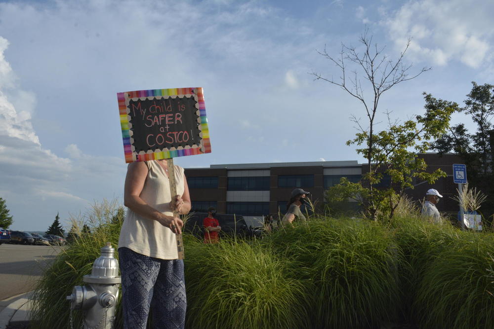 Woman in Cherokee County protest plan for schools to reopen.