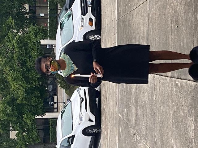 Erica Woodford, Clerk of the Bibb County Superior Court attends a candlelight vigil in front of the federal courthouse in Macon.