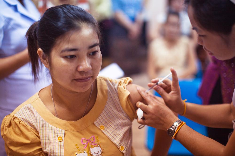 A person is injected with a vaccine