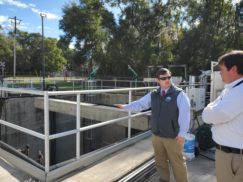 Brunswick-Glynn County Joint Water-Sewer Commission Executive Director Andrew Burroughs and Director of Engineering Todd Klein stand by the wet well at the Academy Creek Wastewater Treatment Plant.