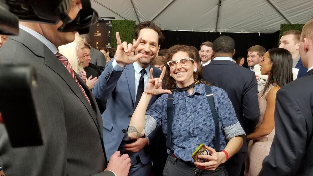 Sign1News staff Martha signs "I love you" with actor Paul Rudd.