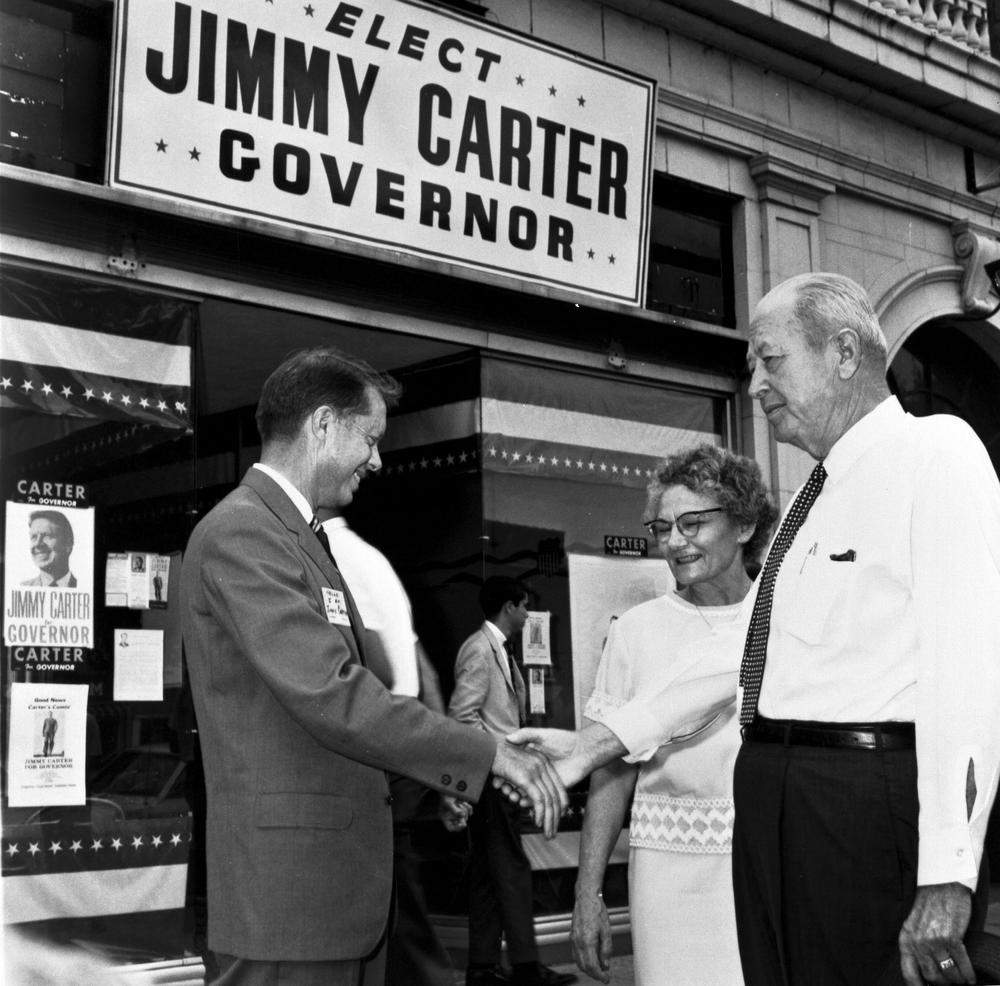 Jimmy Carter shaking hands with voters on while running for Georgia governor.