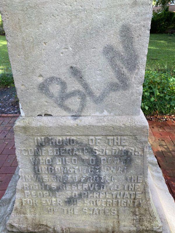 The base of the Brunswick monument bears the fading paint from vandalism earlier this year. 